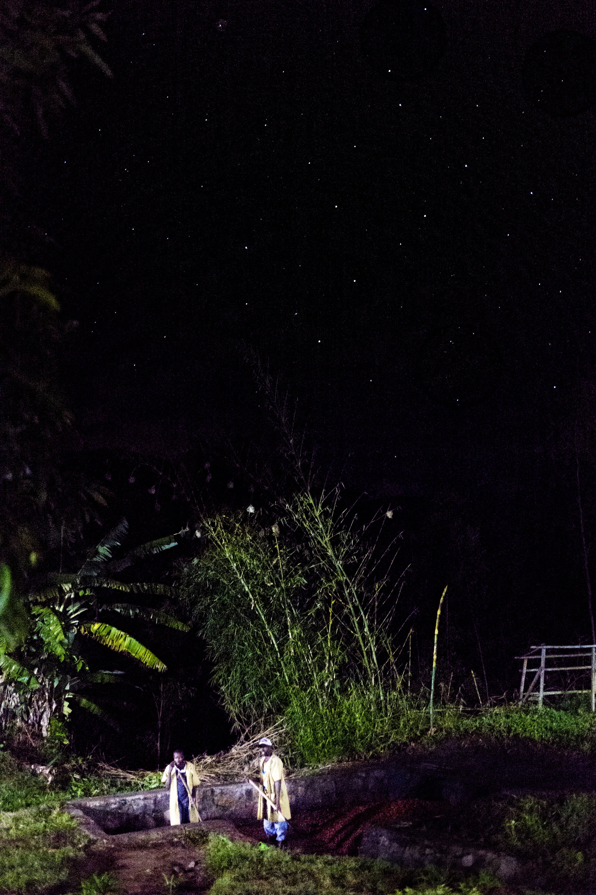 Two men work into the night