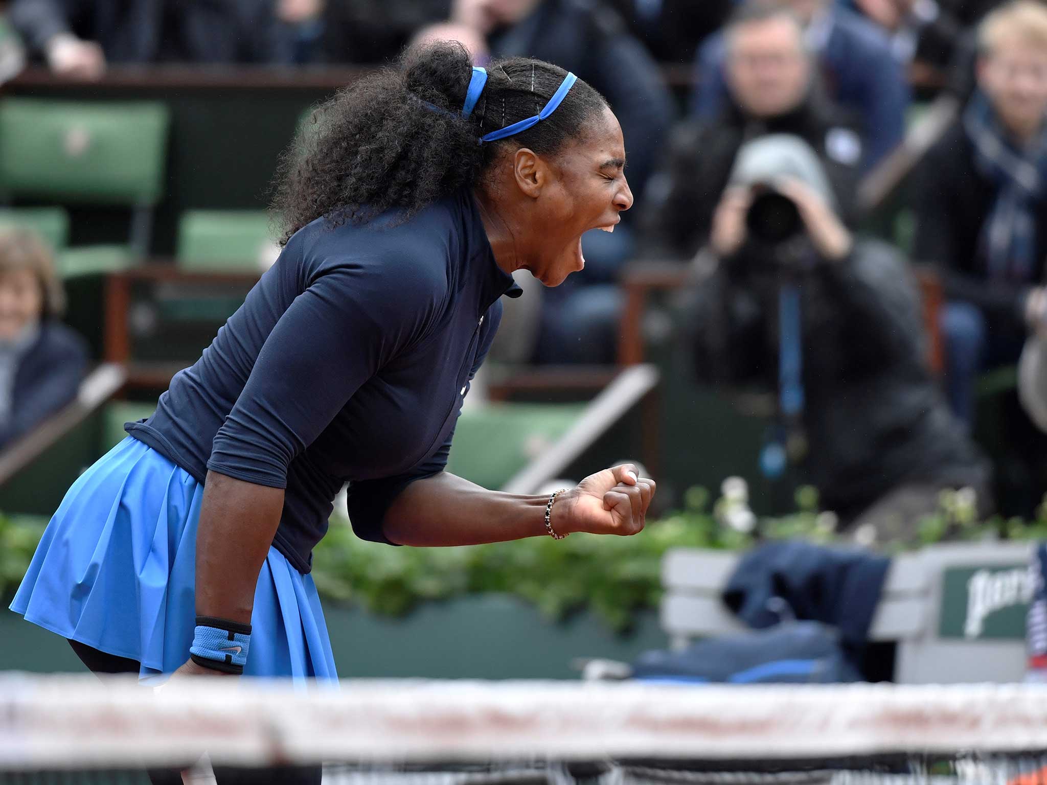 Serena Williams celebrates victory in Paris