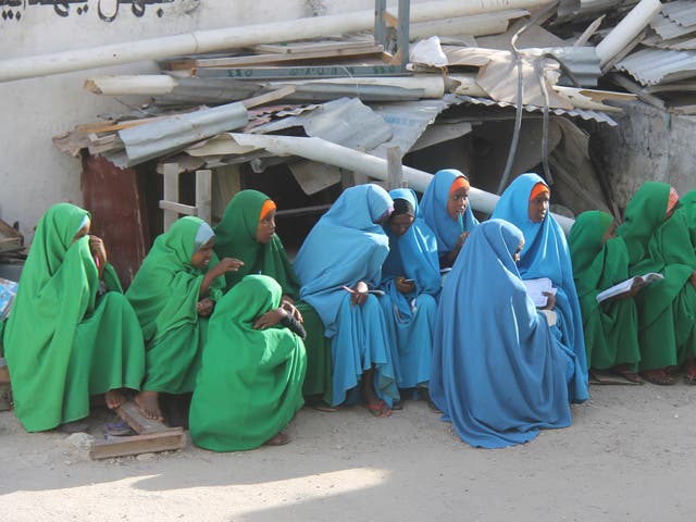 <p>Young girls in Somalia. An estimated 98 per cent of women and girls aged 15-49 in the country have been cut</p>