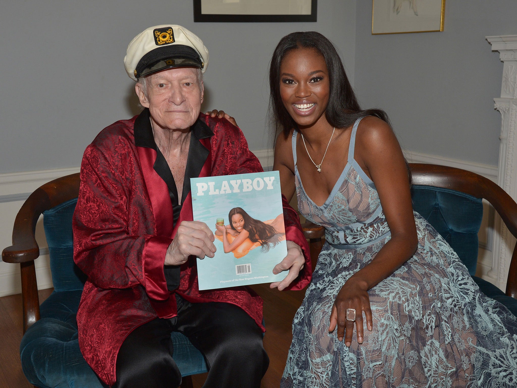 Playboy Founder and Editor-In-Chief Hugh M. Hefner poses with 2016 Playmate of the Year Eugena Washington at Playboy's 2016 Playmate of the Year announcement at the Playboy Mansion on May 11, 2016 in Los Angeles