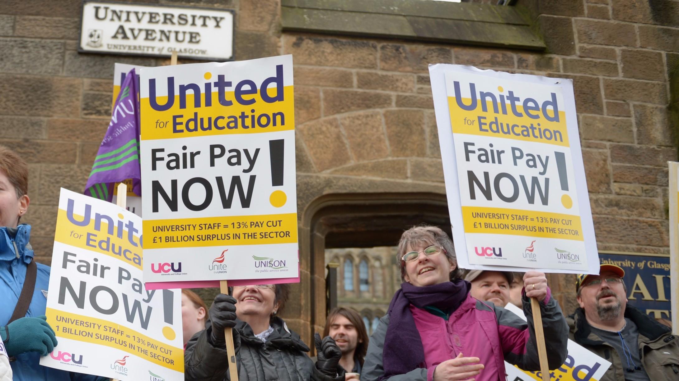 Staff strike outside Glasgow University in a similar dispute in 2013 (Jeff J Mitchell/Getty)