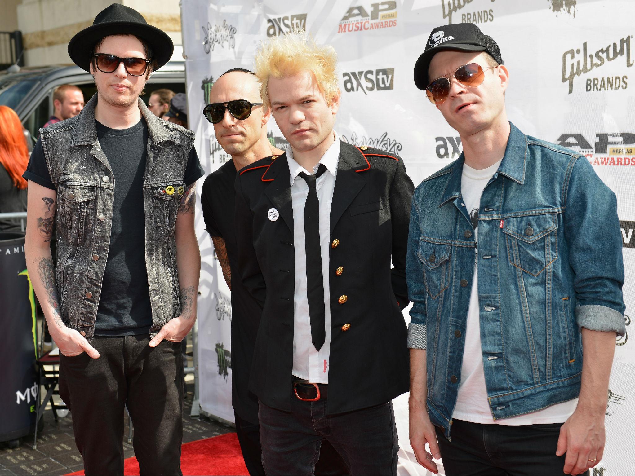 (L-R) Cone McCaslin, Frank Zummo, Deryck Whibley, and Tom Thacker of Sum 41 in 2015