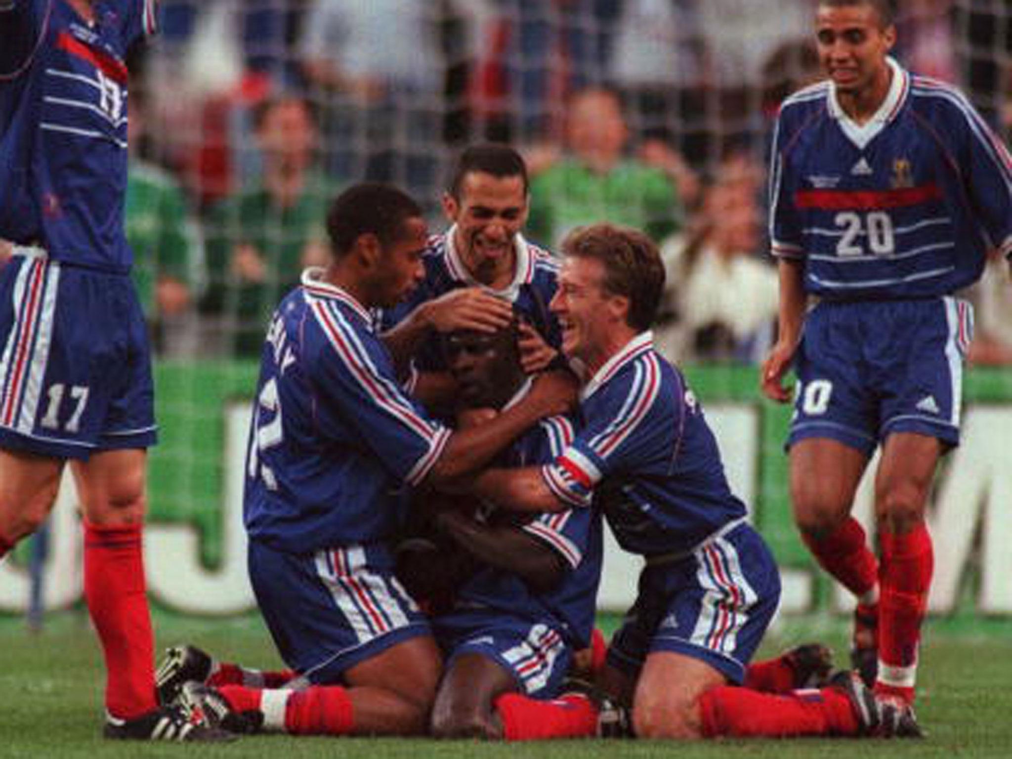 Thierry Henry and Didier Deschamps celebrate a Lilian Thuram goal during France's 1998 World Cup semi-final win over Croatia (Getty)