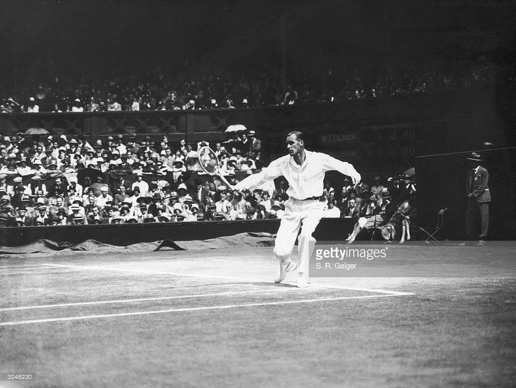 Bill Tilden plays a return during the 1930 Wimbledon men's singles final - his final Grand Slam triumph (Getty)