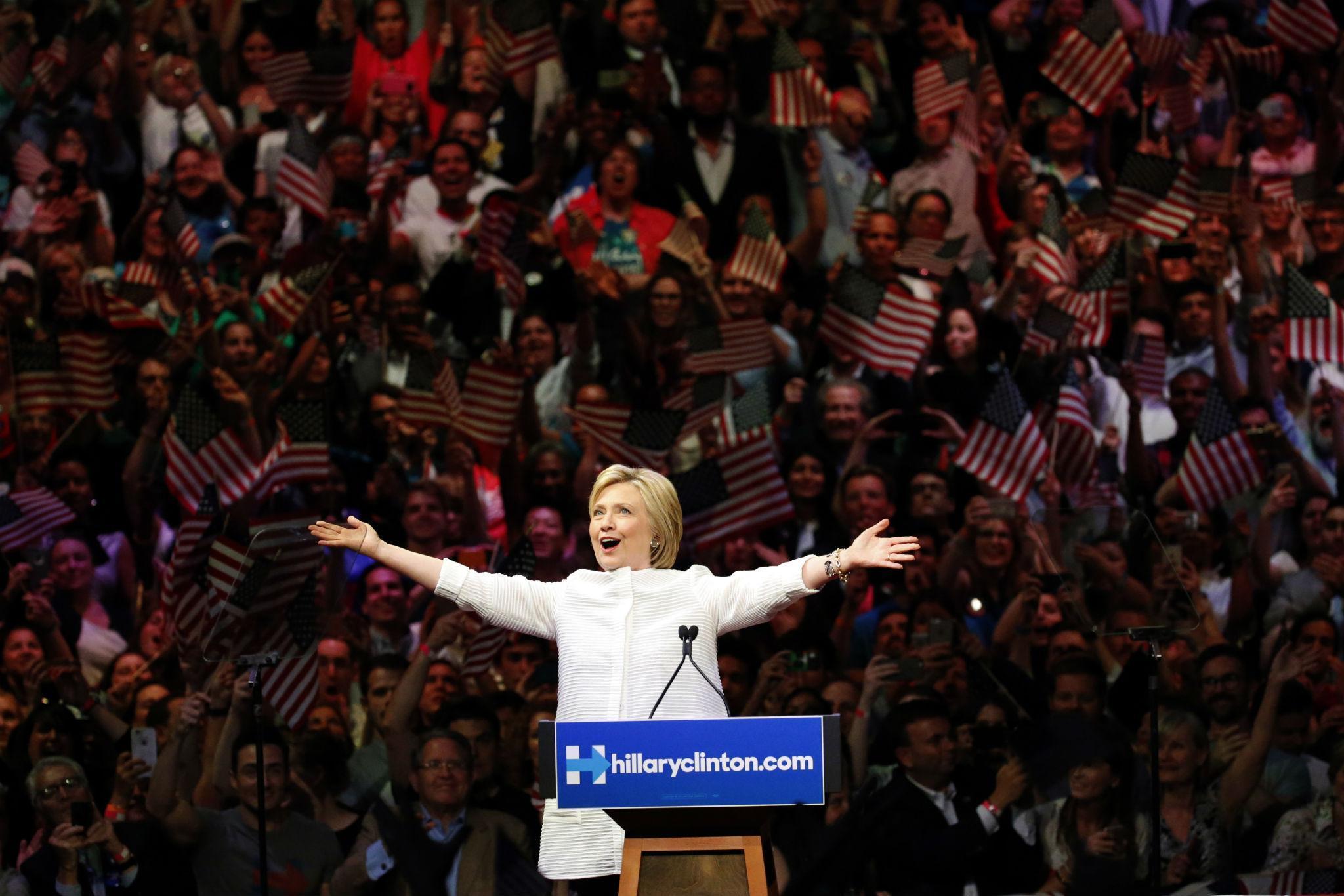 Hillary Clinton celebrates clinching the Democratic presidential nomination with supporters in Brooklyn, New York (AP)