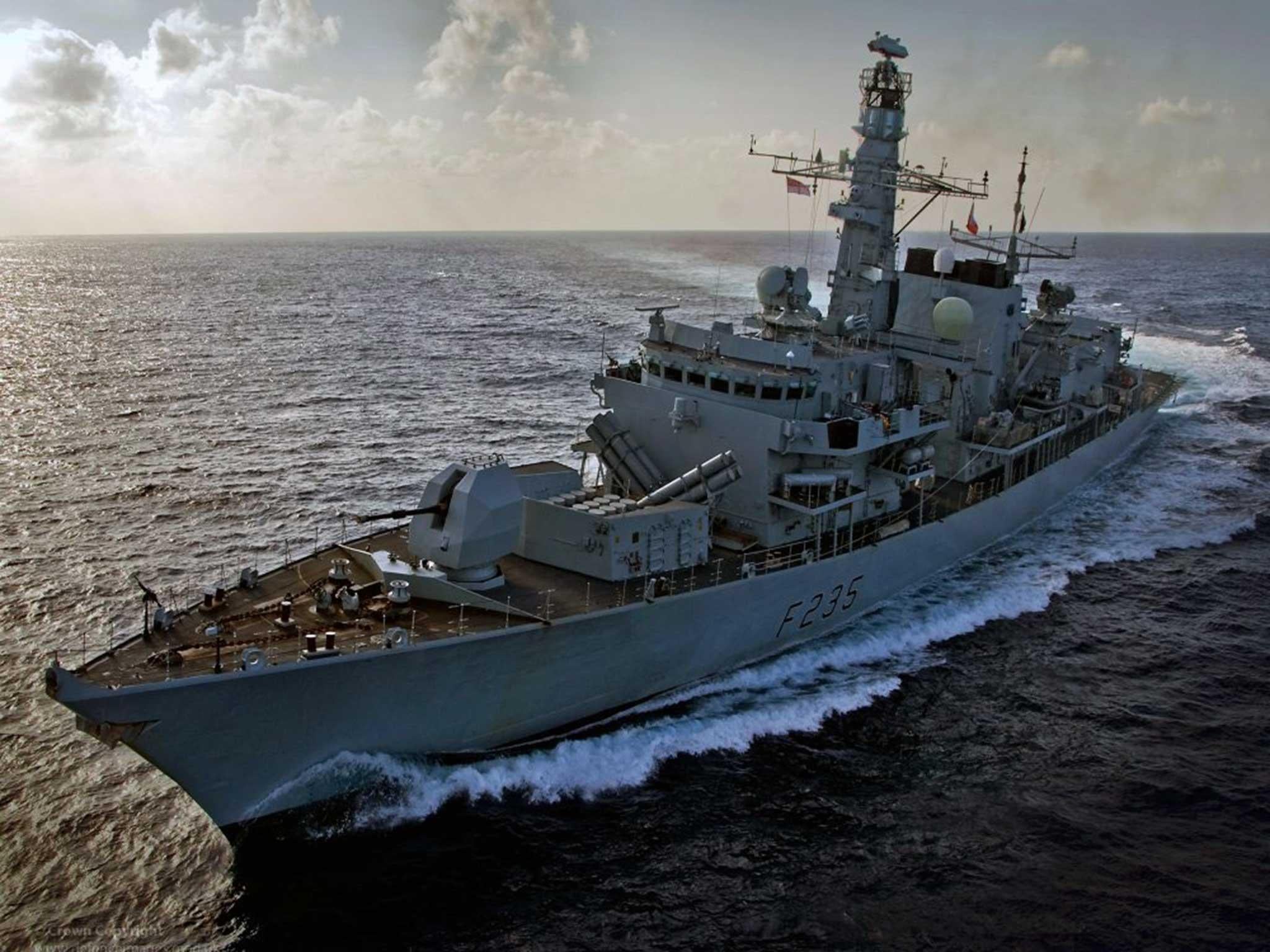 Type 23 frigate HMS Monmouth cuts through the English Channel on her way to a deployment in the Middle East