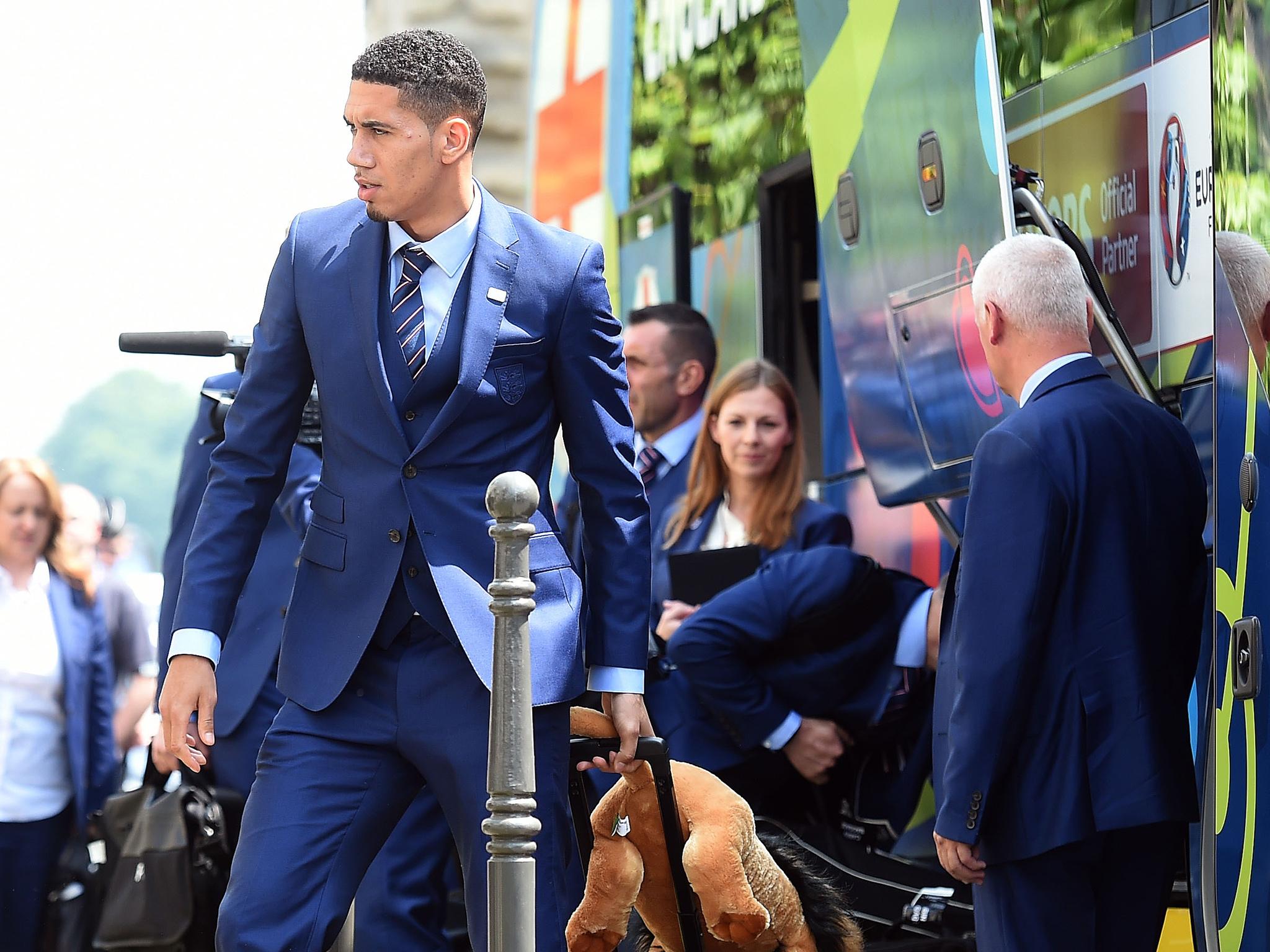 Smalling carries 'Leo' into the England team's hotel in Chantilly