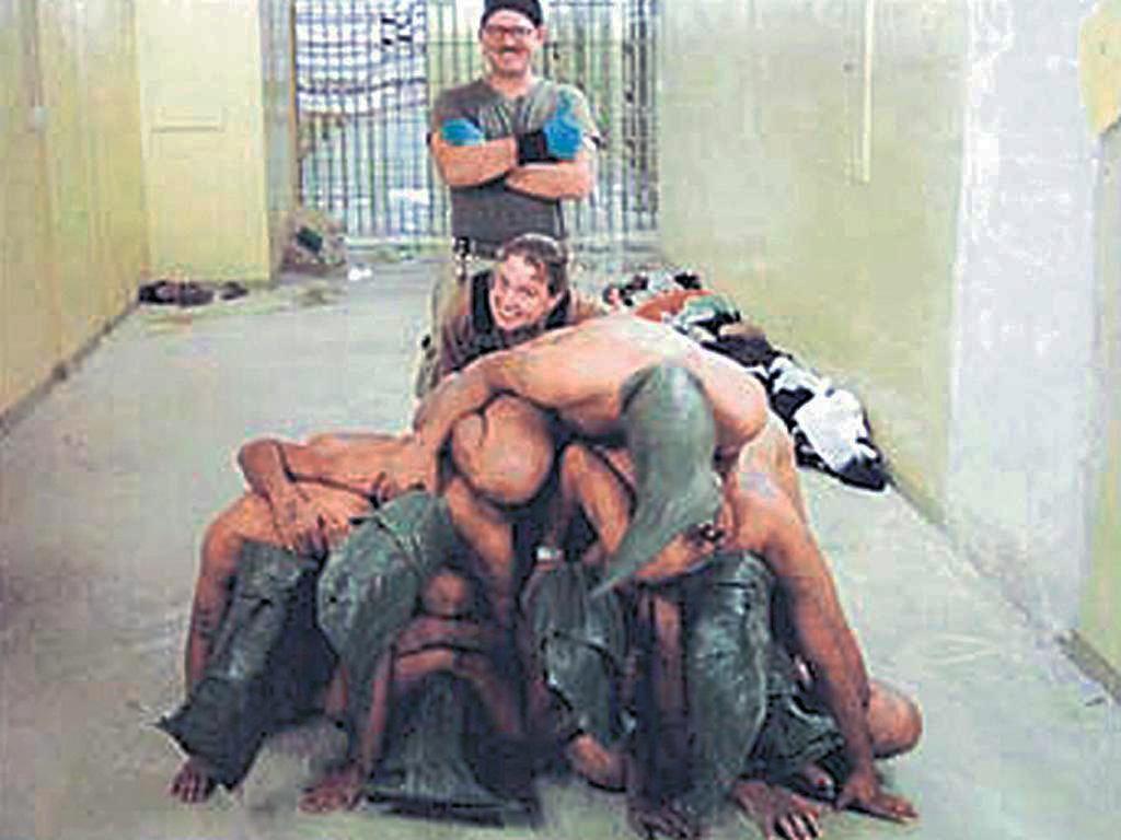 Naked Iraqi detainees forced to form a human pyramid – one of several distressing images to emerge from Abu Ghraib