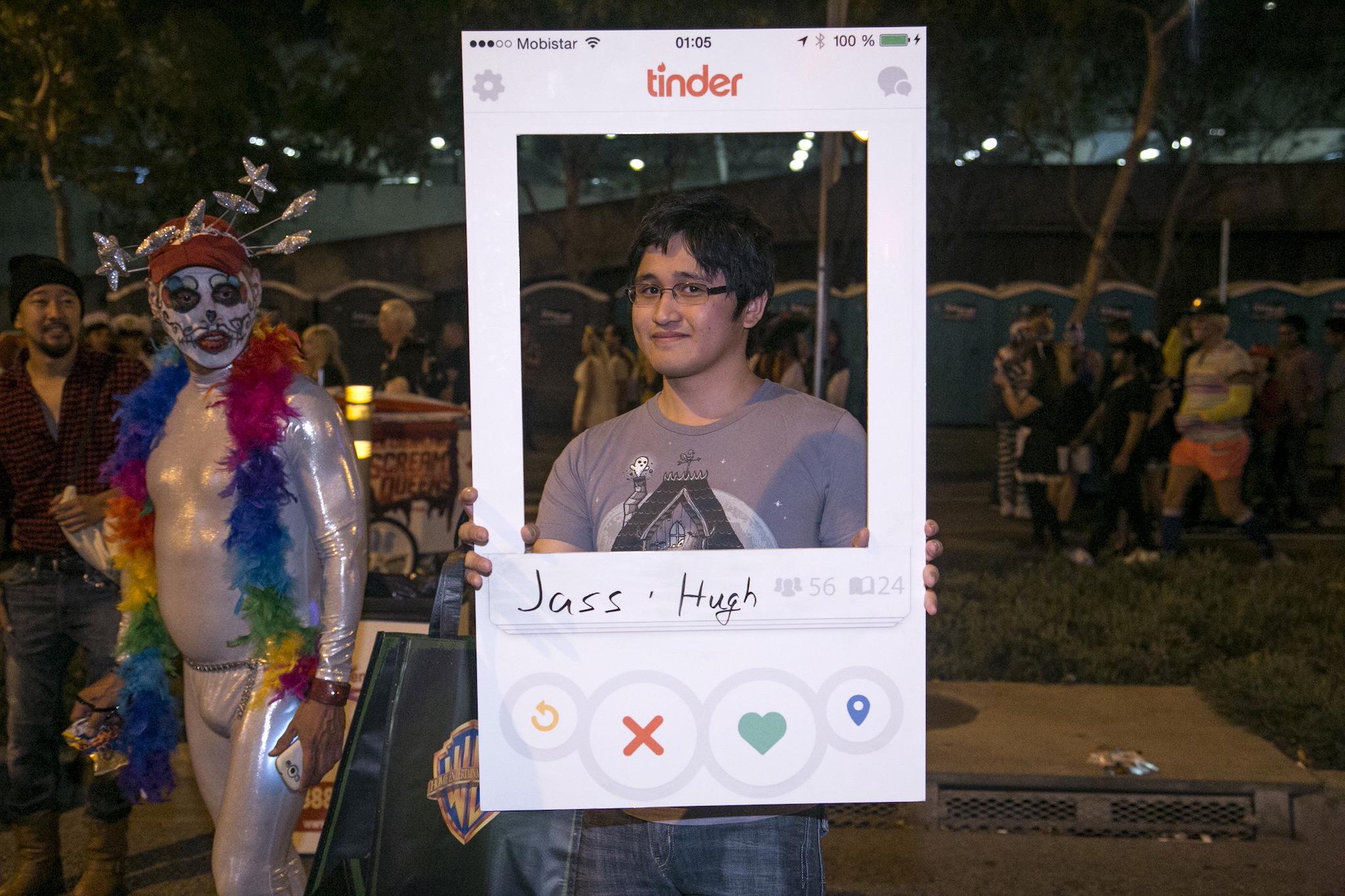 Joel Balcita shows his homemade Tinder App costume at the West Hollywood Halloween Costume Carnaval, which attracts nearly 500,000 people annually