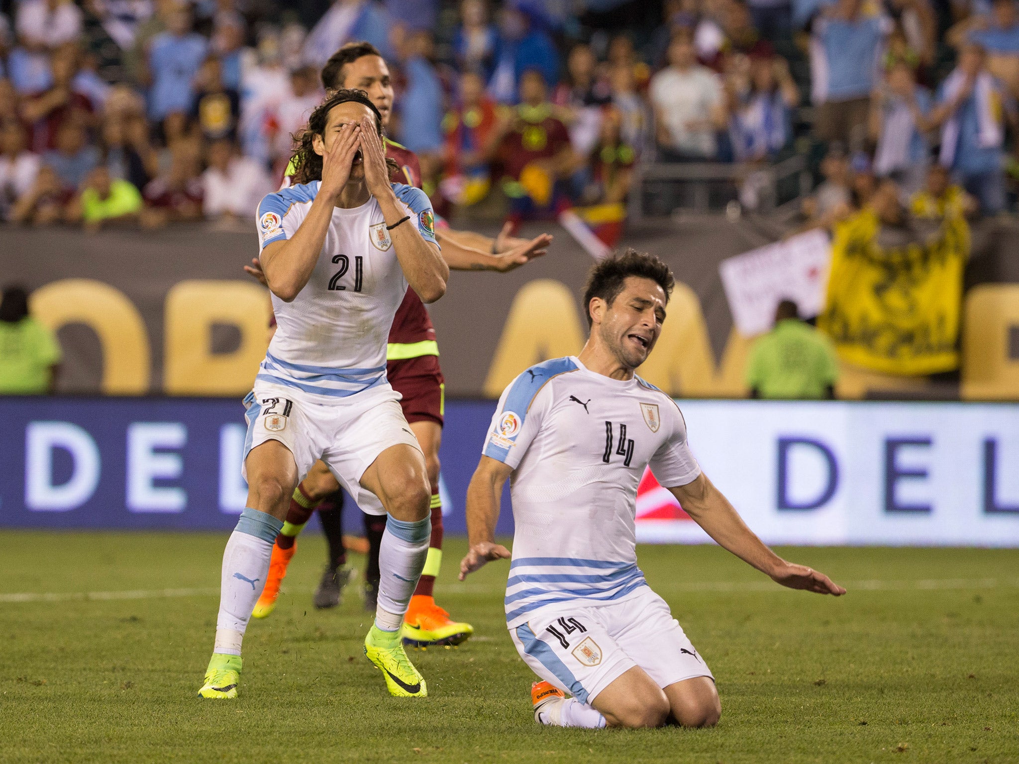 Edinson Cavani reacts after Nicolas Lodeiro misses a chance