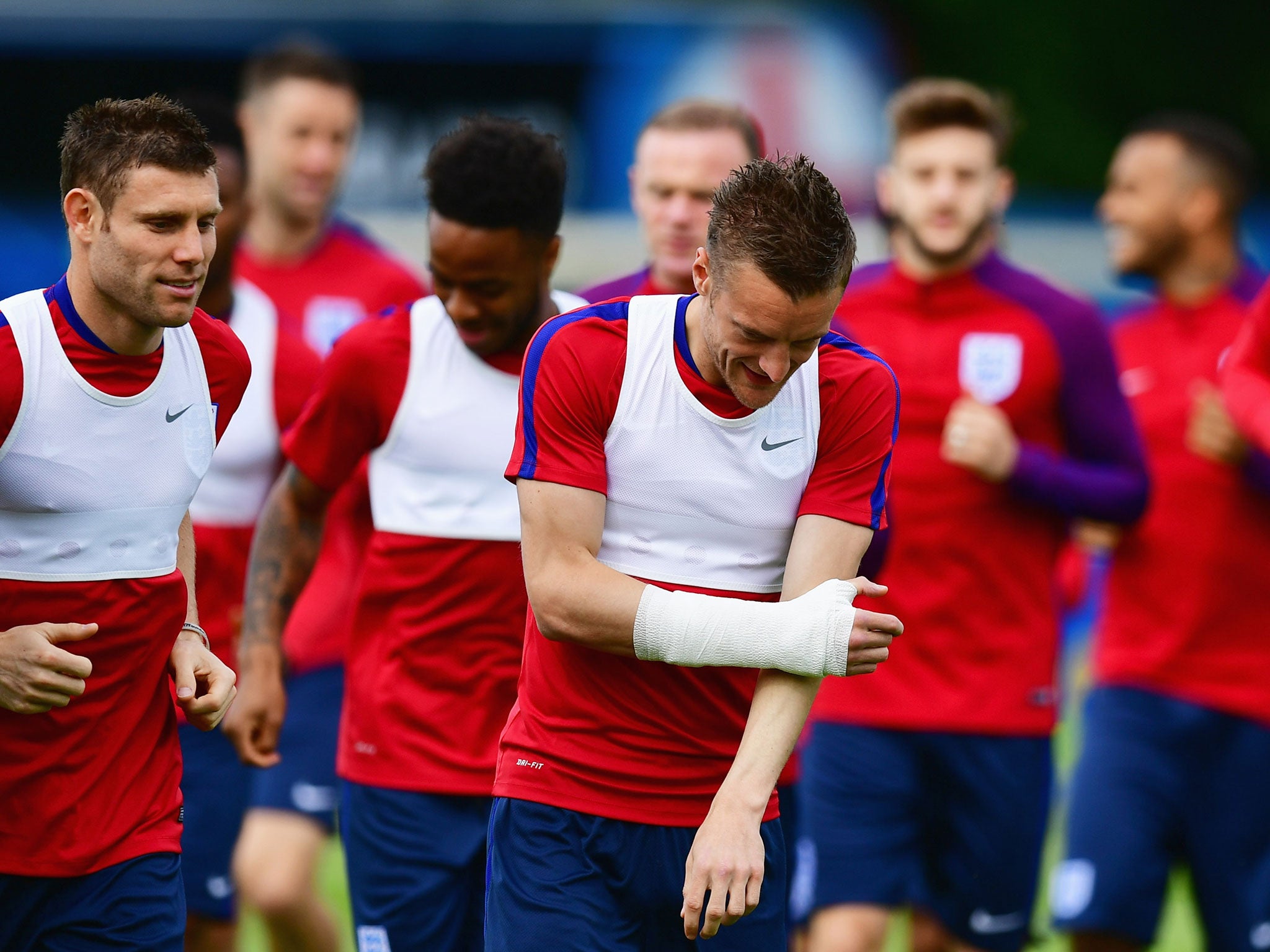 Jamie Vardy with James Milner in training