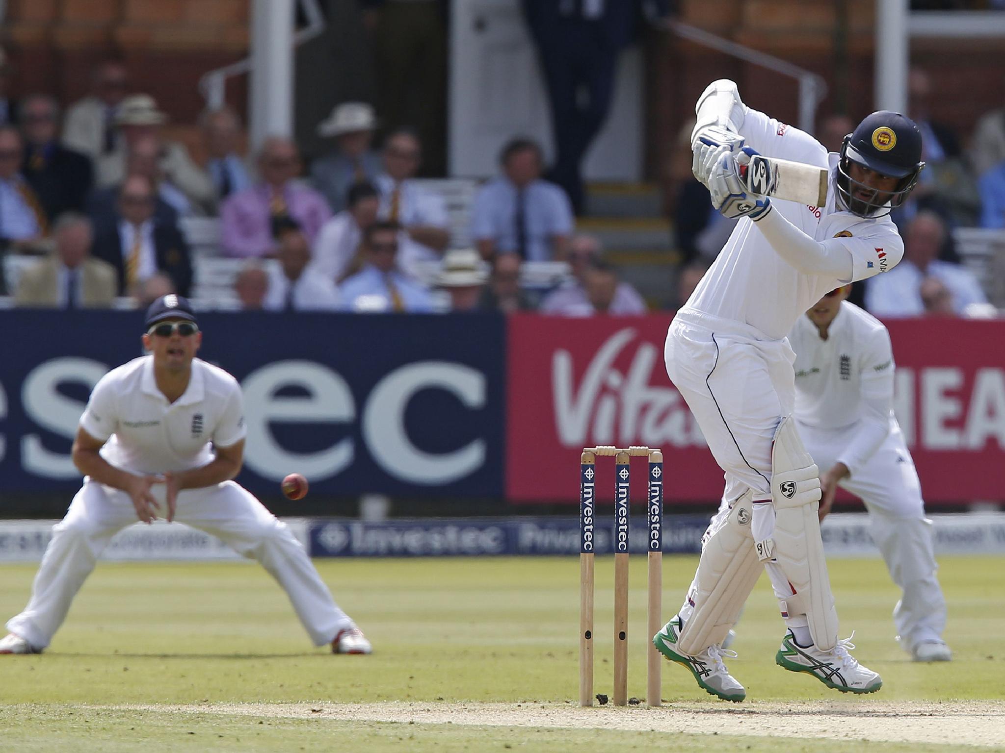 Dimuth Karunaratne plays a shot into the leg-side during the second day