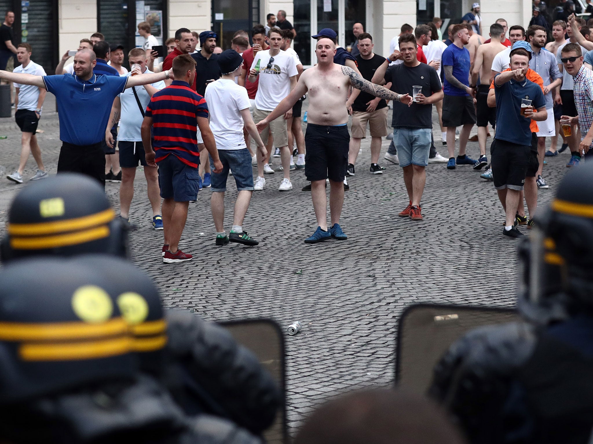 England football fans shout as they clash with police in Marseille