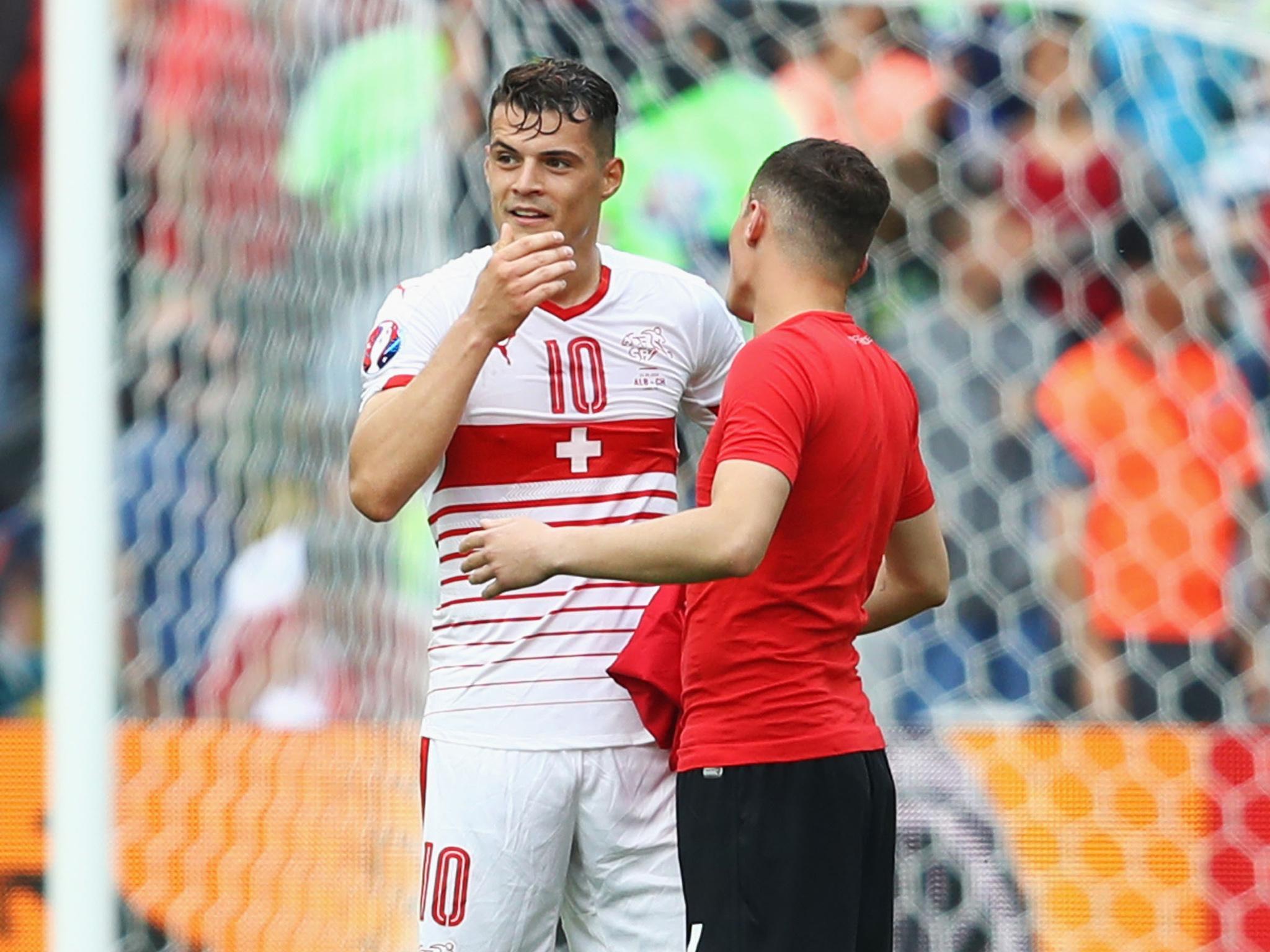 Granit and Taulant Xhaka, who are brothers, played on opposing sides