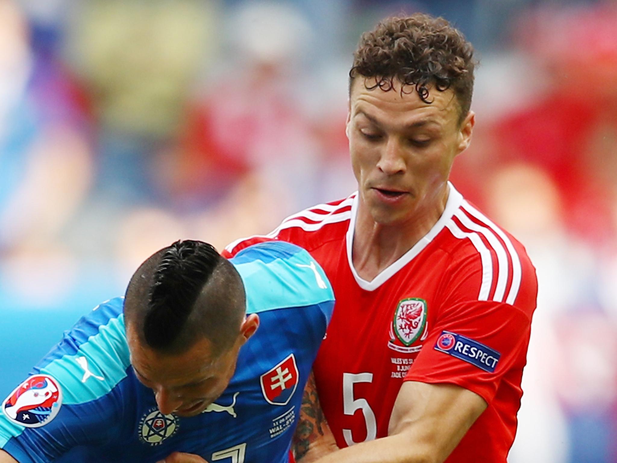 Defended very well alongside Davies and Williams. Solid partnership.