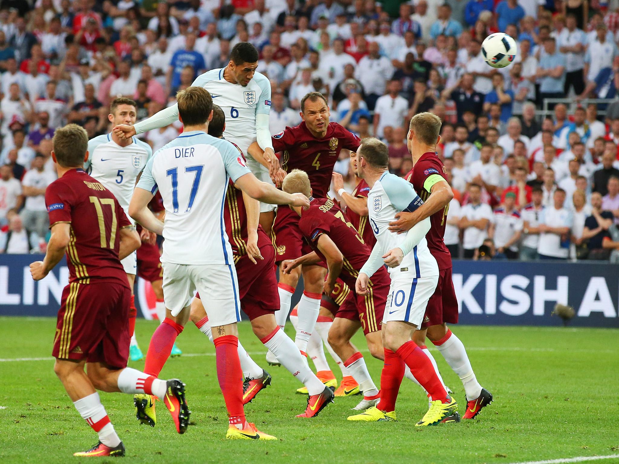 &#13;
Chris Smalling heads an effort towards goal &#13;