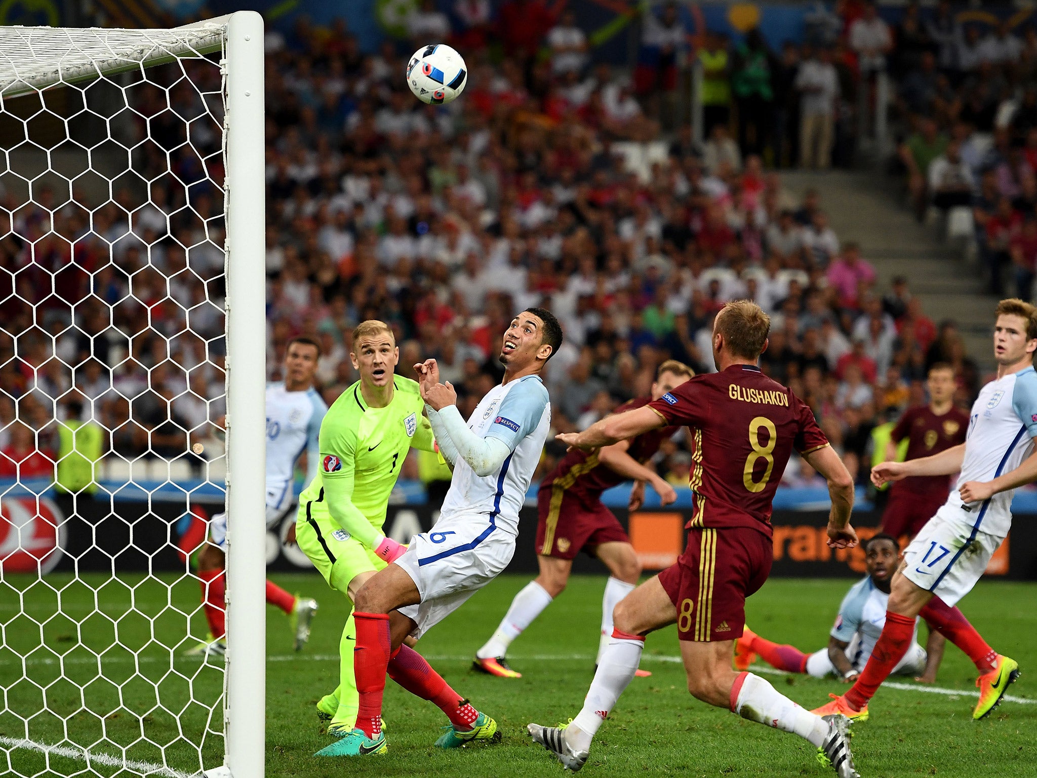 Joe Hart and Chris Smalling can do nothing to stop Vasili Berezutski's headed equaliser