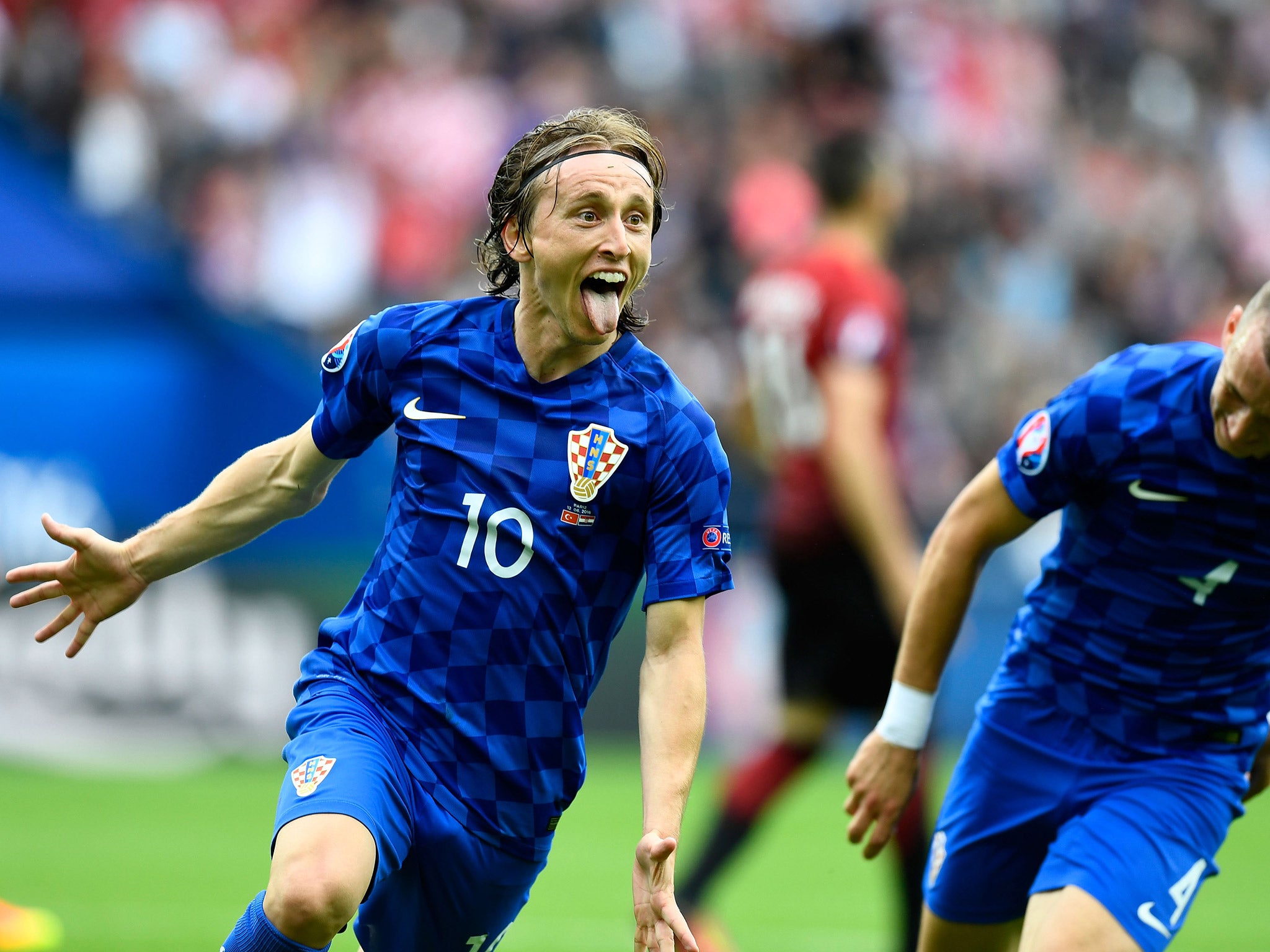 Luka Modric celebrates after giving Croatia the lead over Turkey with a wonder strike