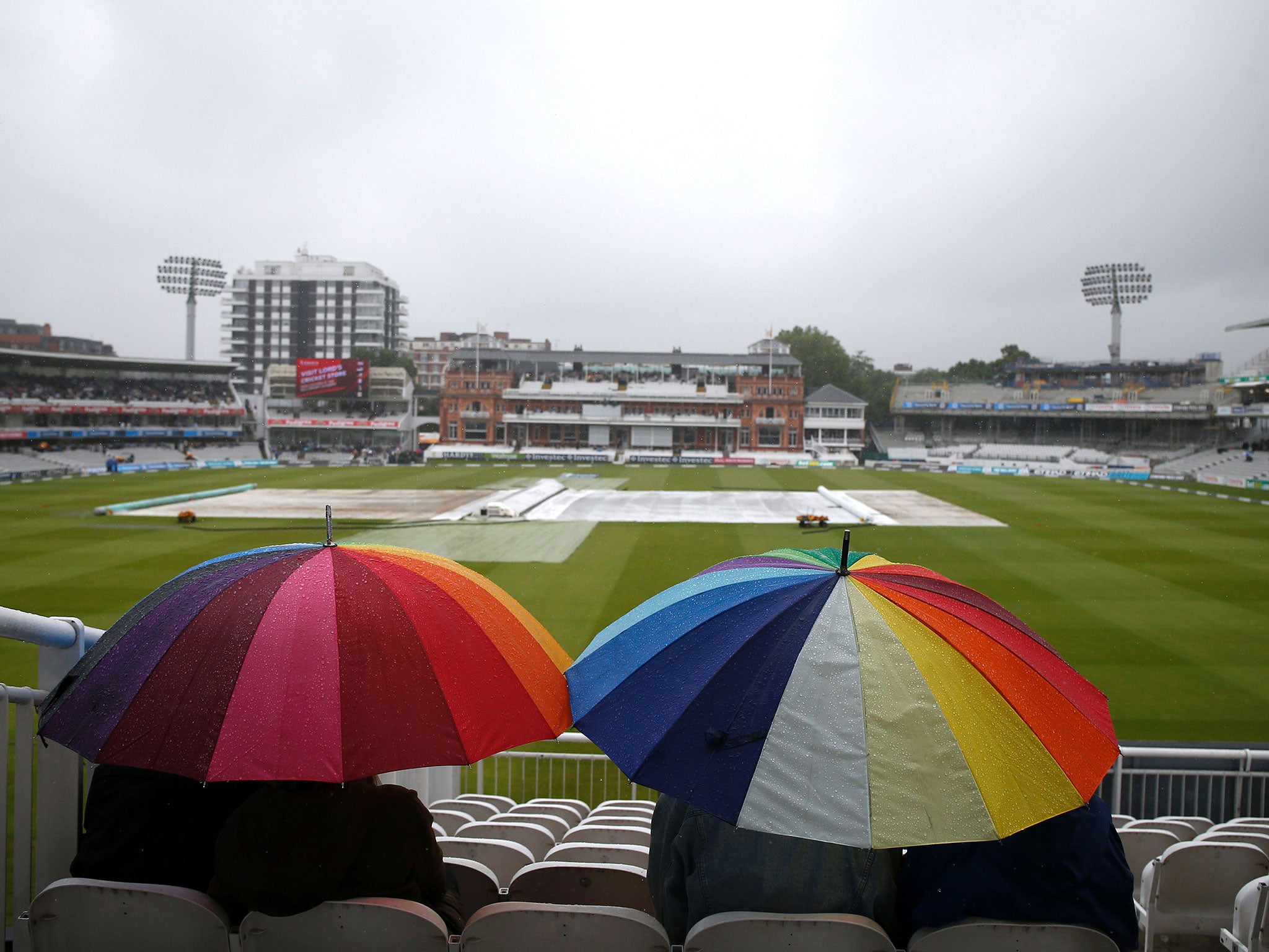 Fans look on at Lord's on day four of the Third Test