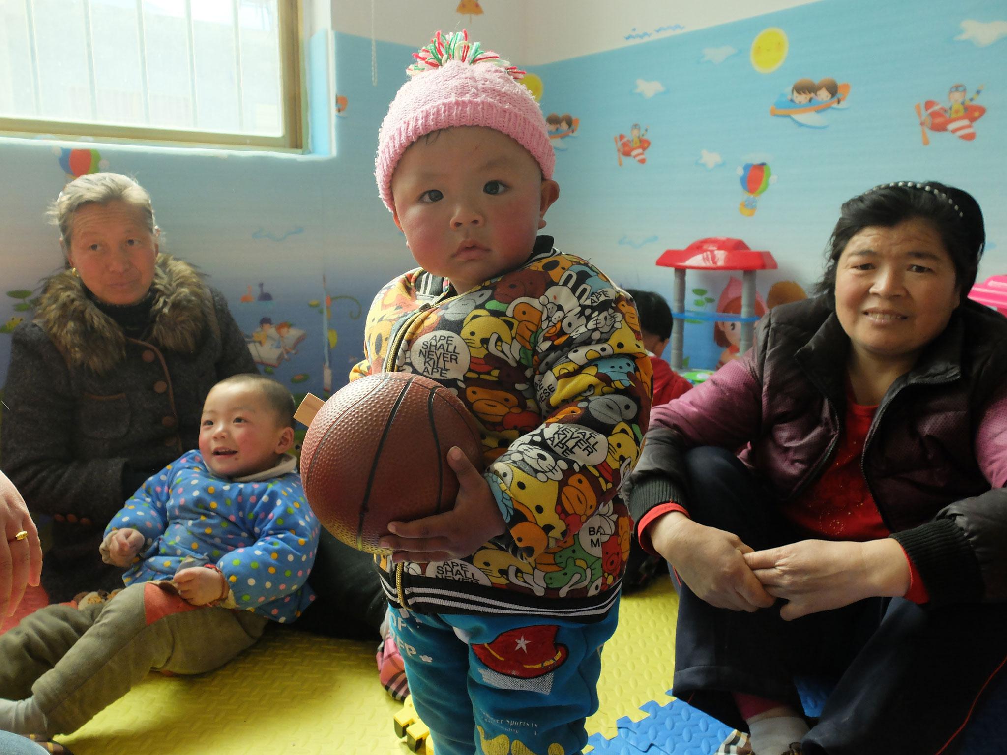 &#13;
The four-room education centre is a burst of life and colour in the sparse village &#13;