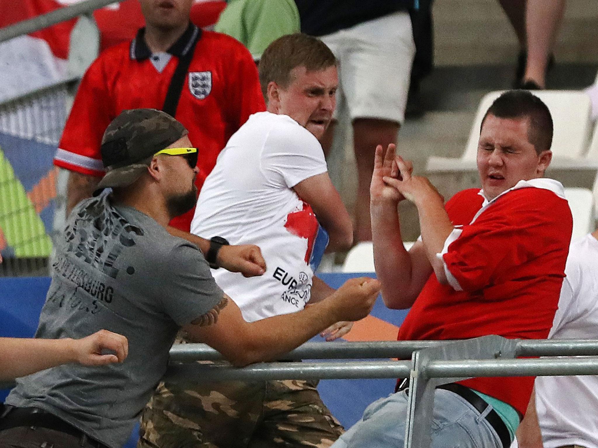 Russia and England fans clash at the end of their 1-1 draw in Marseille