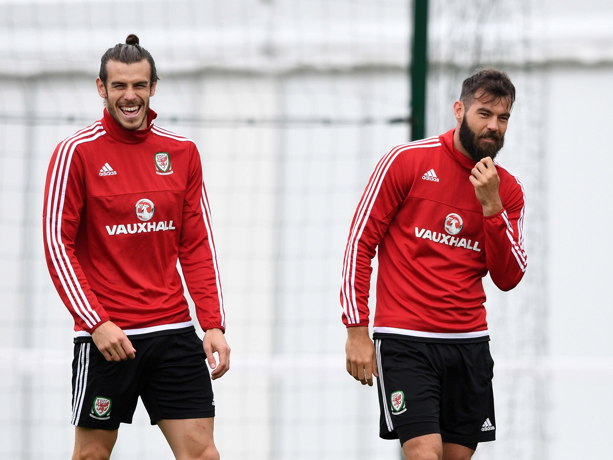 Gareth Bale (left) and Joe Ledley enjoy a laugh in training