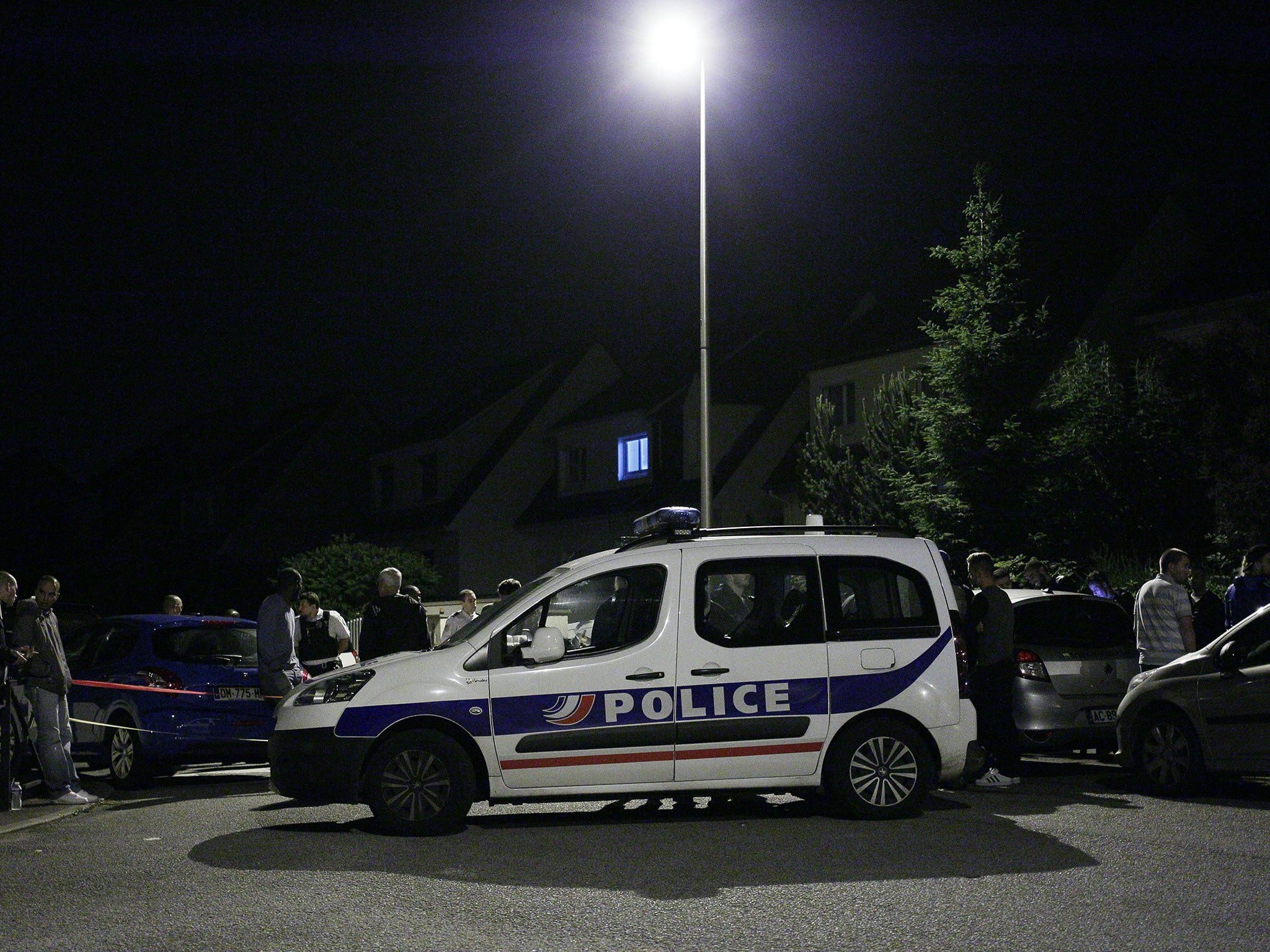 A vehicle blocks the road during the poolice assault in Magnanville