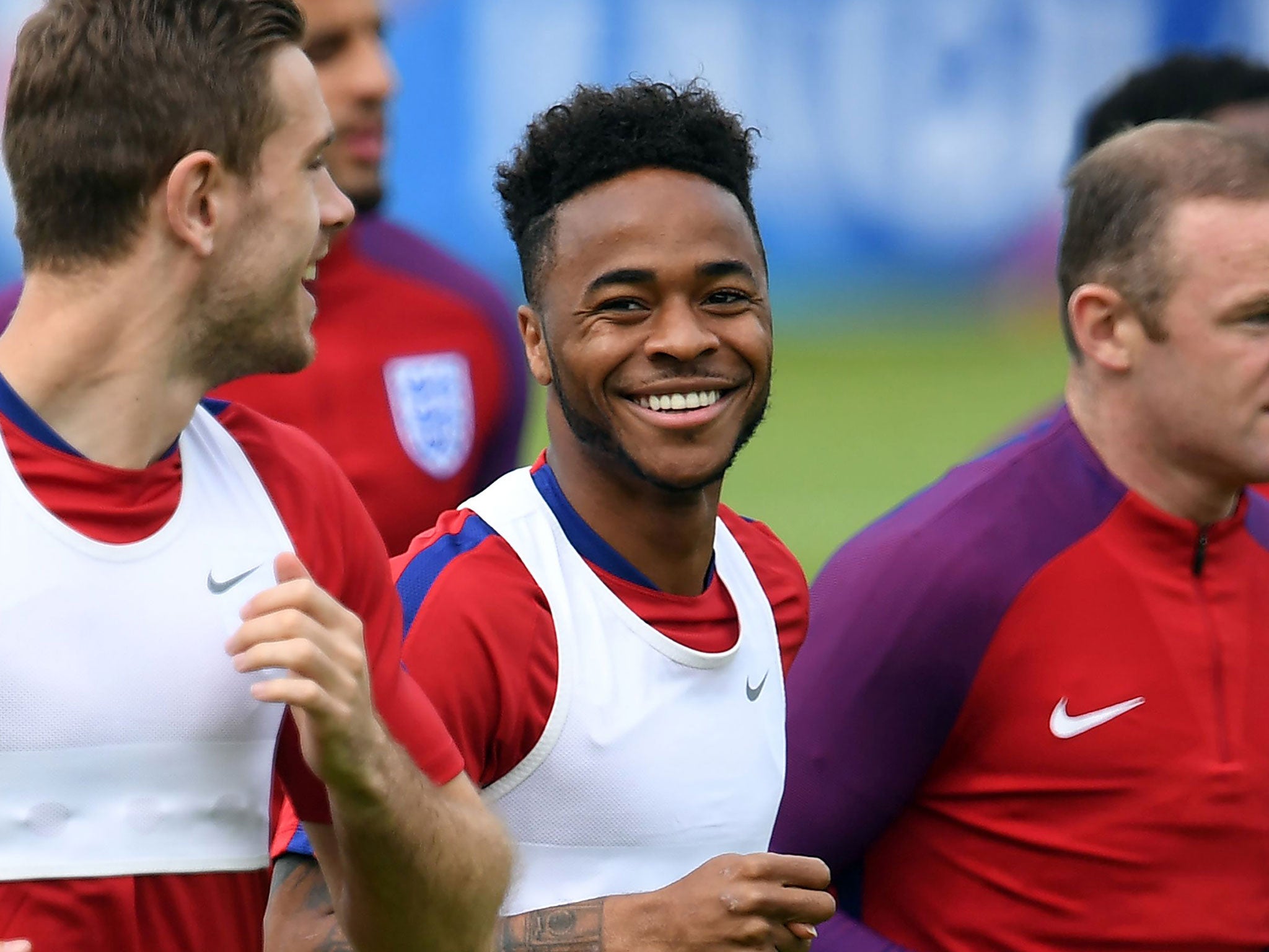 Raheem Sterling trains with the rest of the England squad