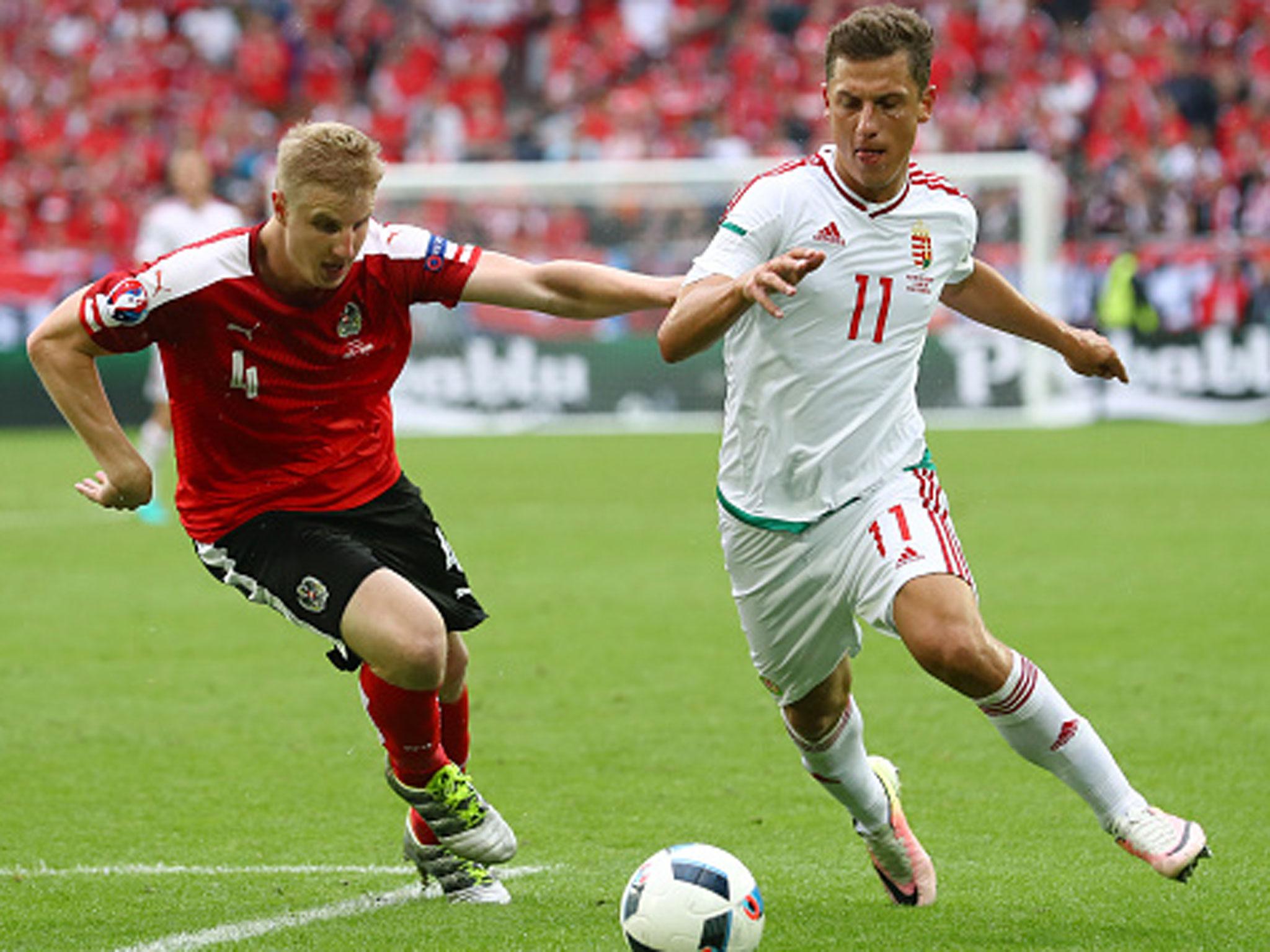 Krisztian Nemeth of Hungary takes on Austria's Martin Hinteregger in Bordeaux on Tuesday (Getty)