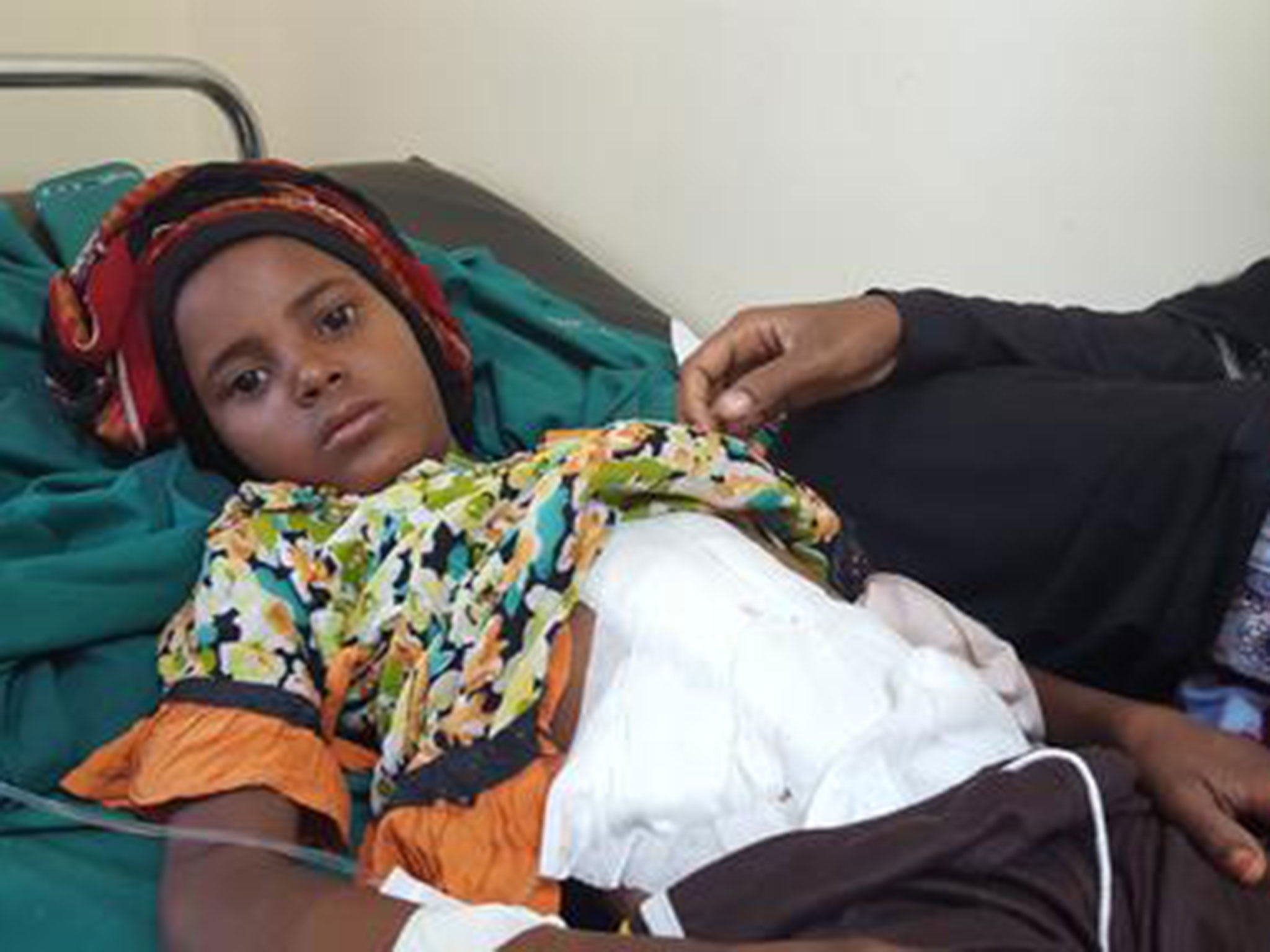 Sunood, 12, years old girl, was collecting water when she was shot in Taiz, Yemen, in April