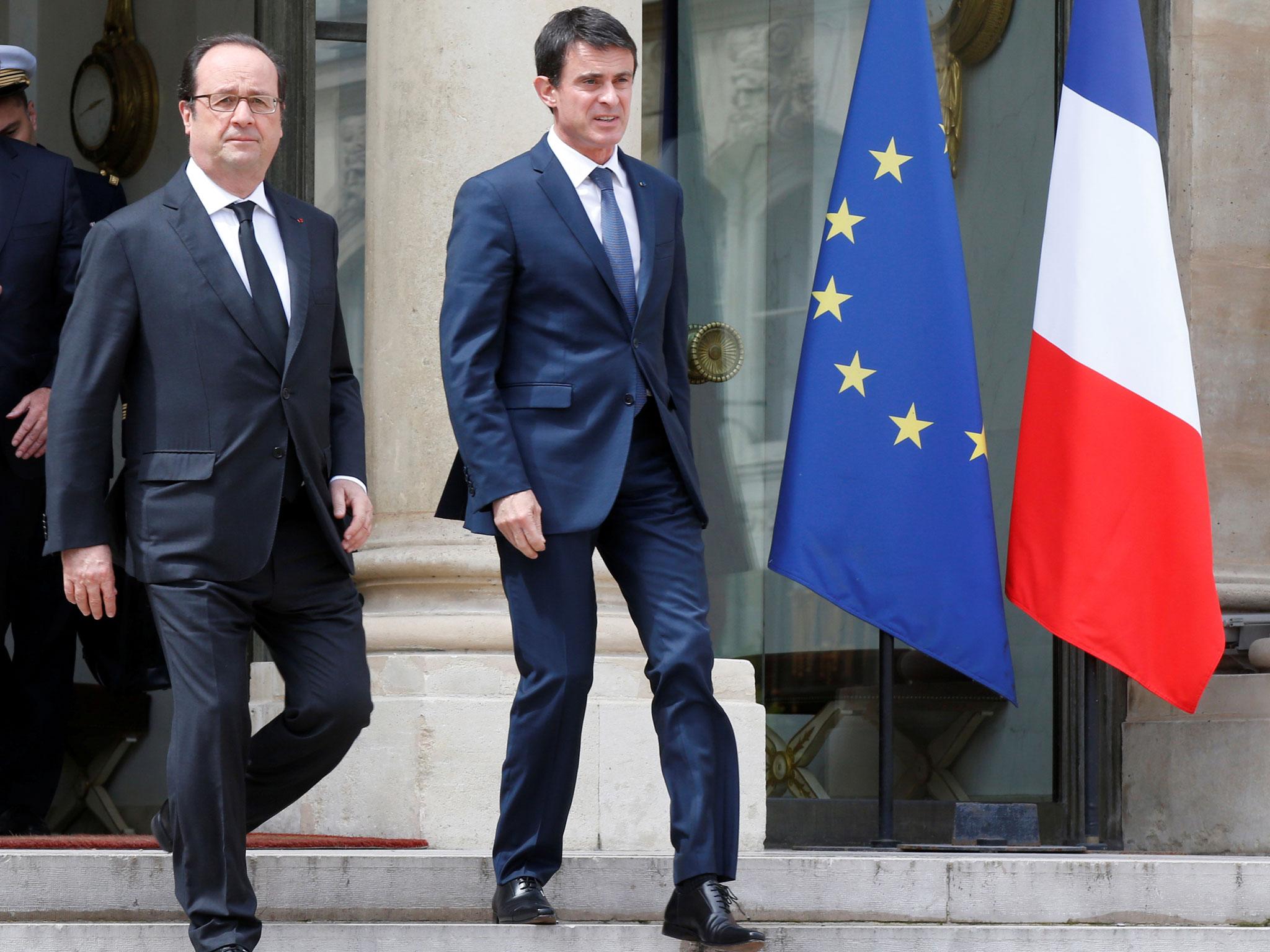 &#13;
French President François Hollande, left, and Prime Minister Manuel Valls, right, both condemned the violence. &#13;