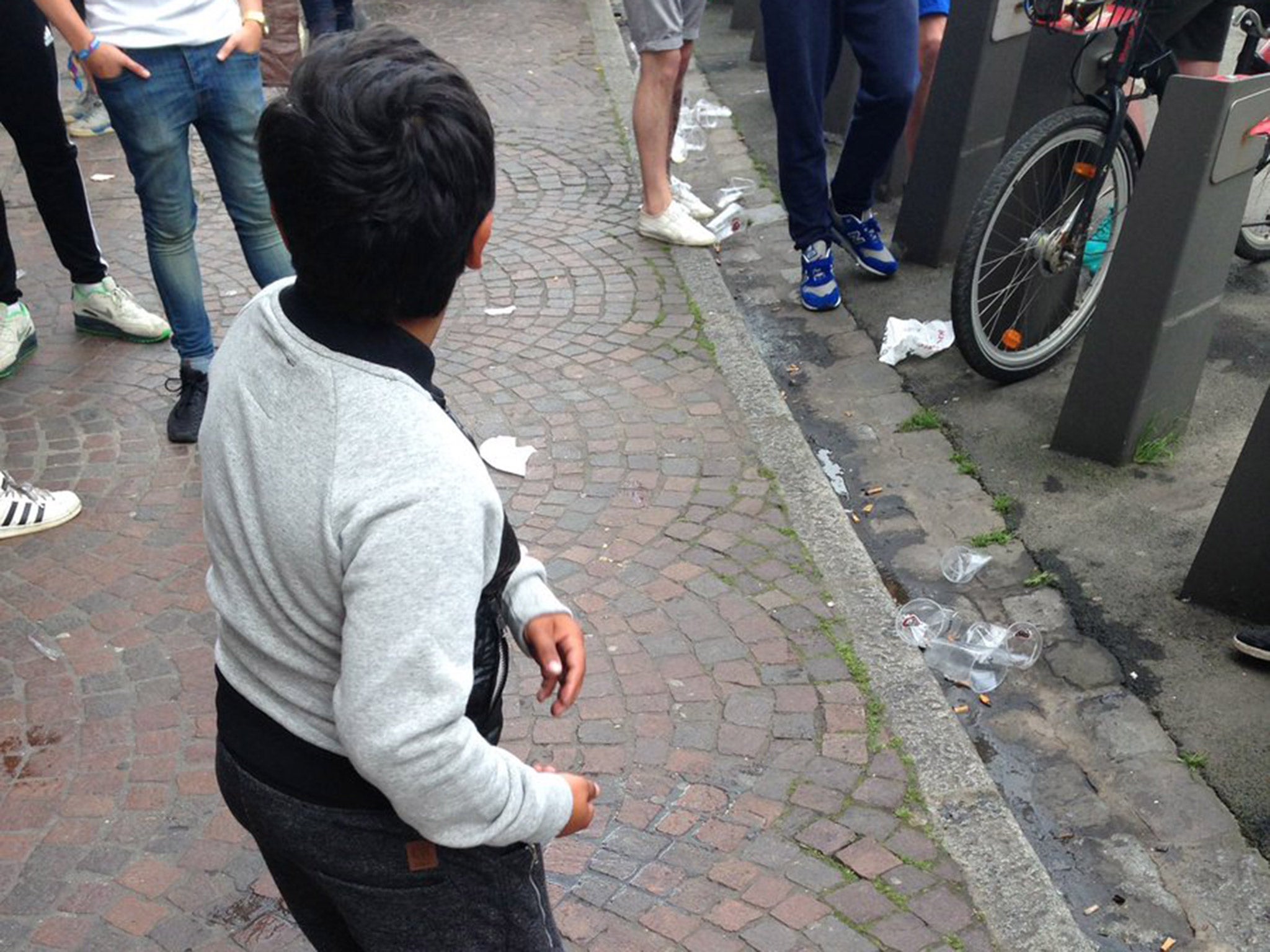 A young boy was said to have been made to drink beer by England fans in exchange for money