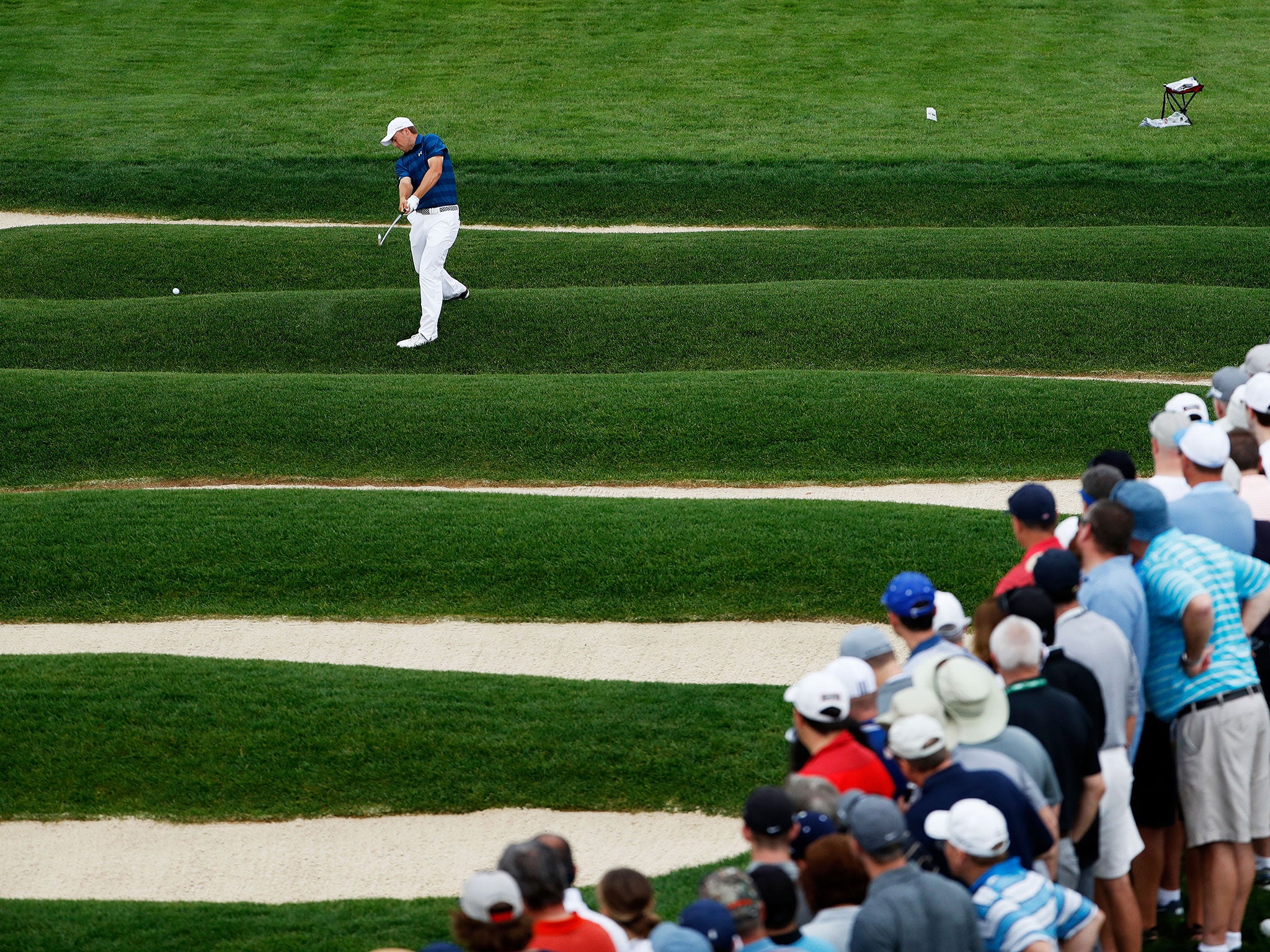 Jordan Spieth takes on the Church Pews bunker at the 15th at Oakmont