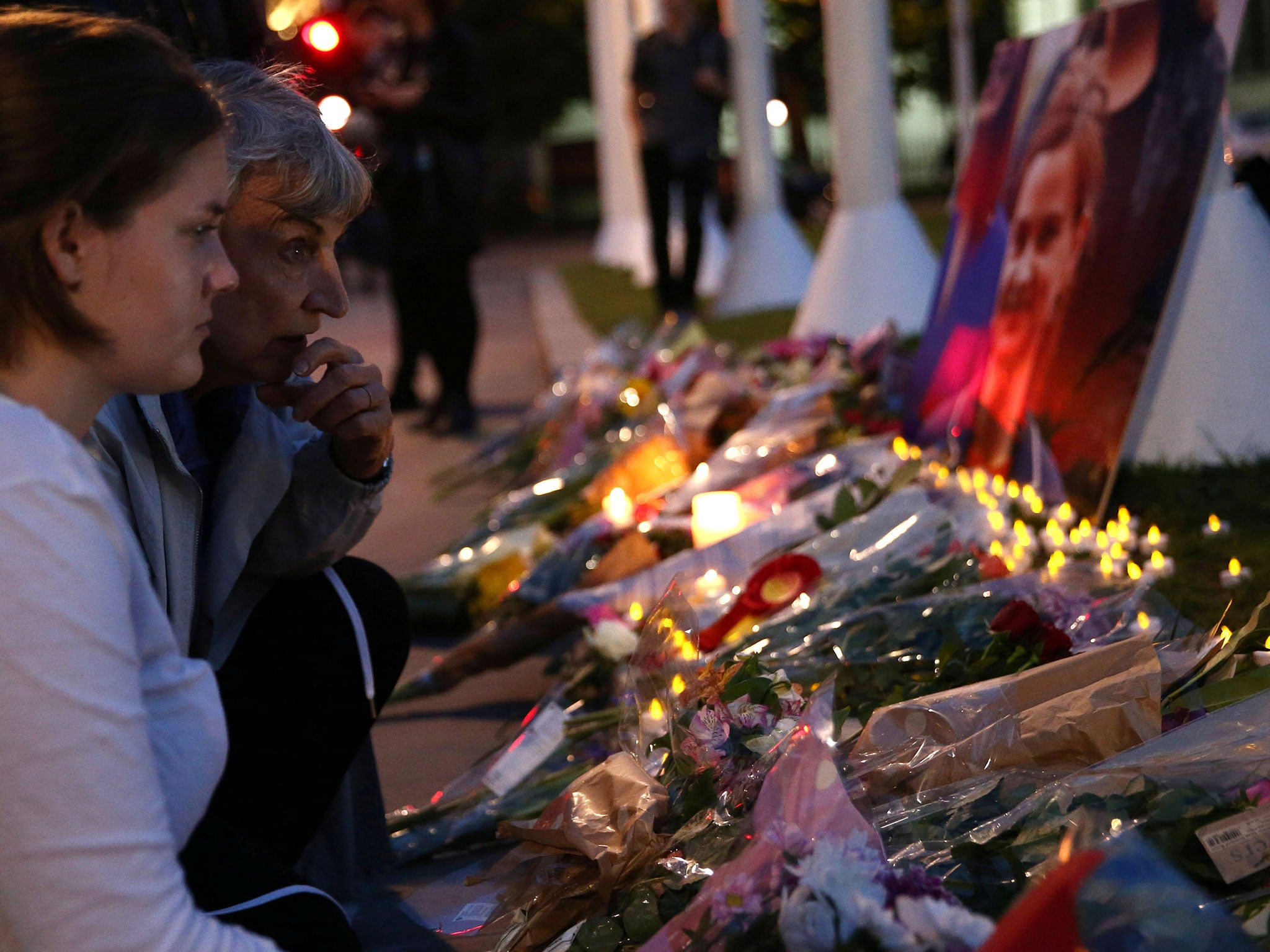 People view tributes for Labour Party MP Jo Cox at Parliament Square in London on June 16, 2016.