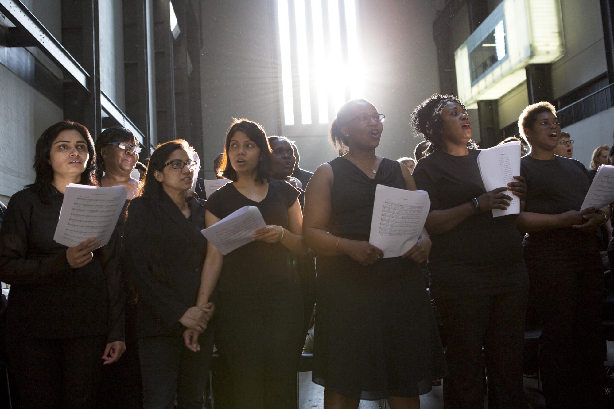 Singers rehearse for a performance of Peter Liversidge's The Bridge, 6 June