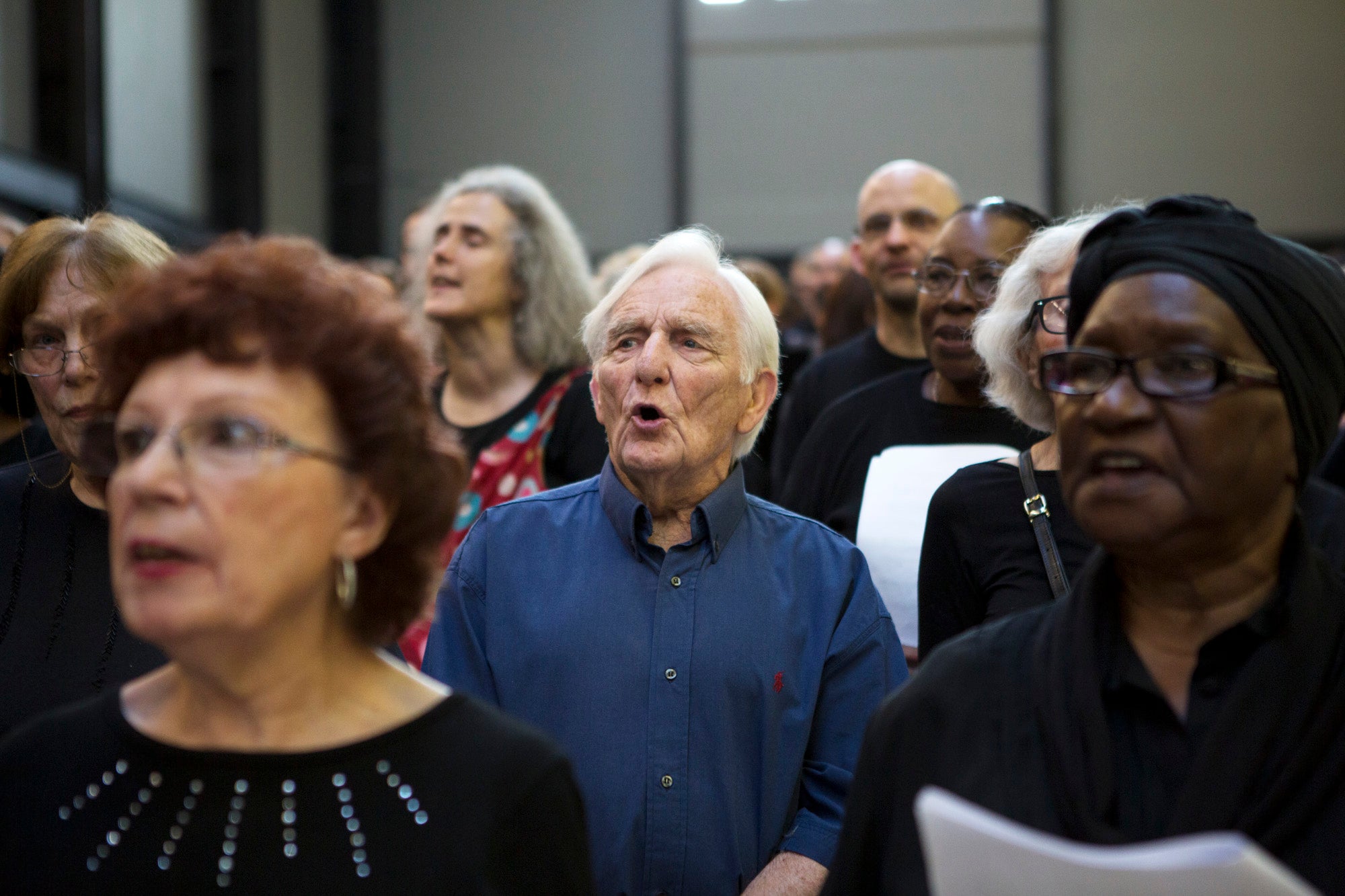 Singers rehearse for a performance of Peter Liversidge's The Bridge, 6 June