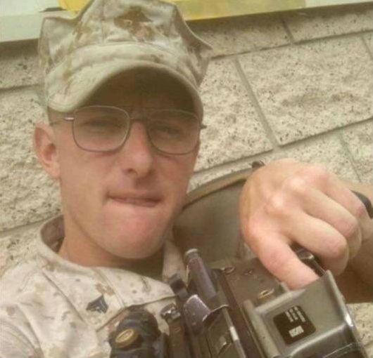 Both the marine that posed and the marine that posted the picture have been identified