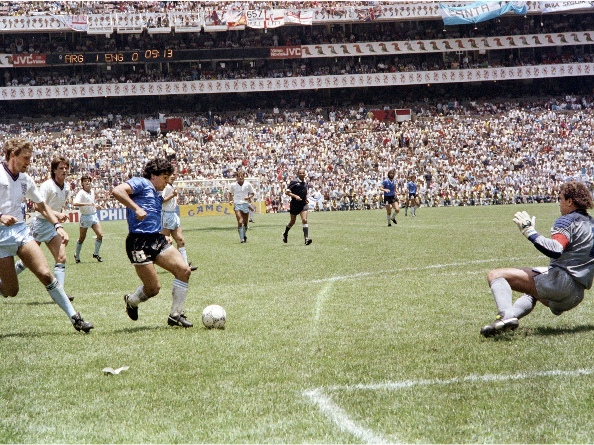 Diego Maradona finishes his amazing second goal past Peter Shilton in the World Cup quarter-final