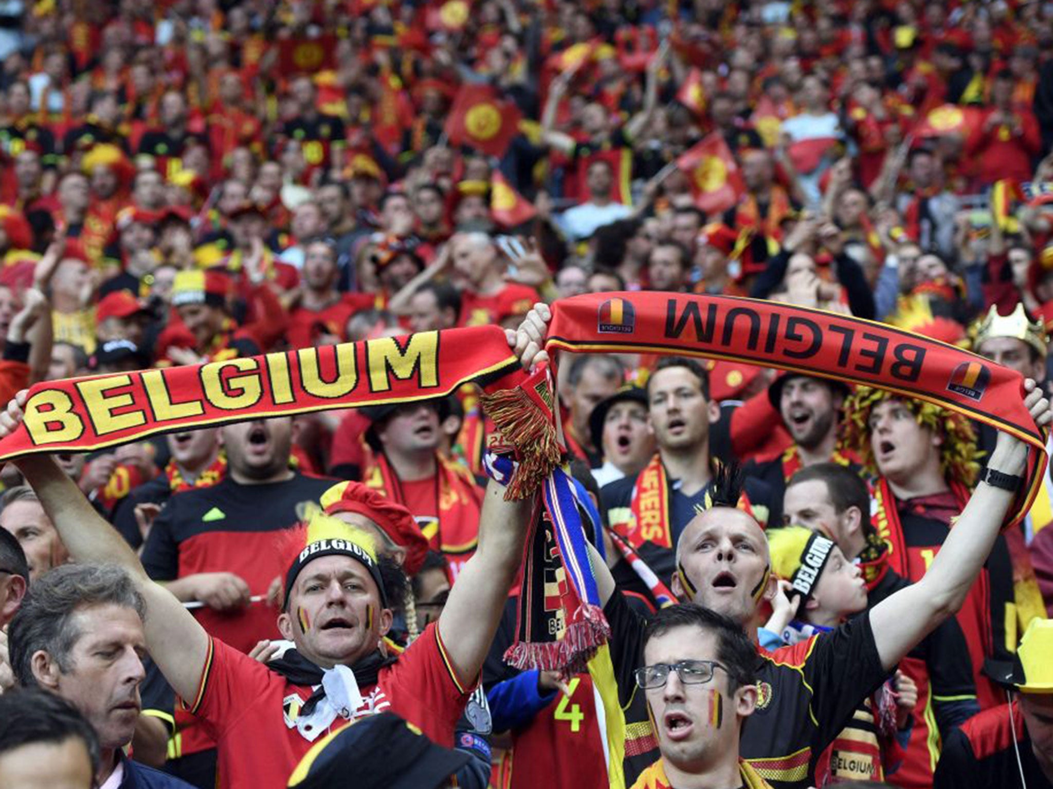 Belgium fans cheer before the start of the Euro 2016 group E football match between Belgium and Italy at the Parc Olympique Lyonnais stadium in Lyon on June 13, 2016.