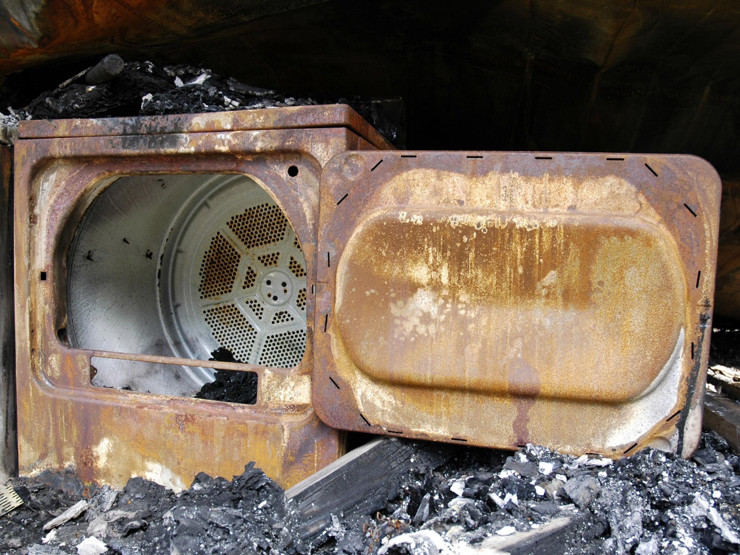 A burned-out tumble dryer