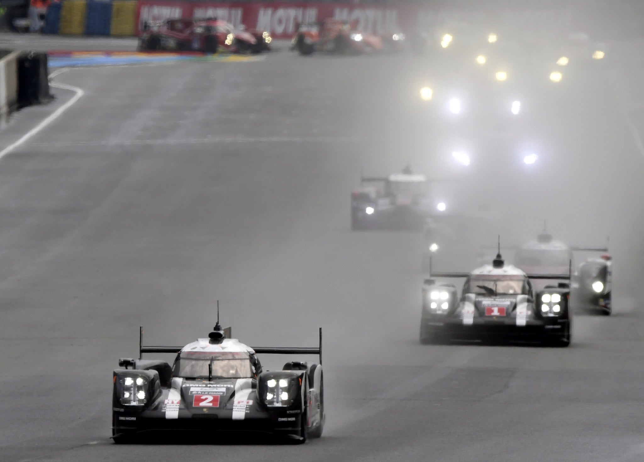 The No 2 Porsche leads as the 2016 Le Mans 24 Hours goes green