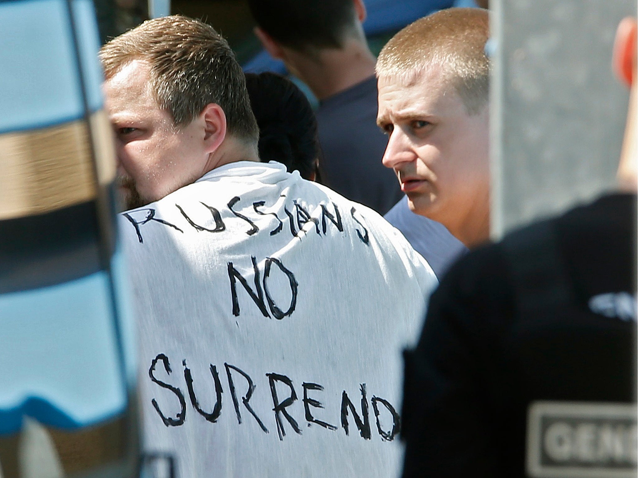 Russian football fans are arrested by French gendarmes after violent clashes