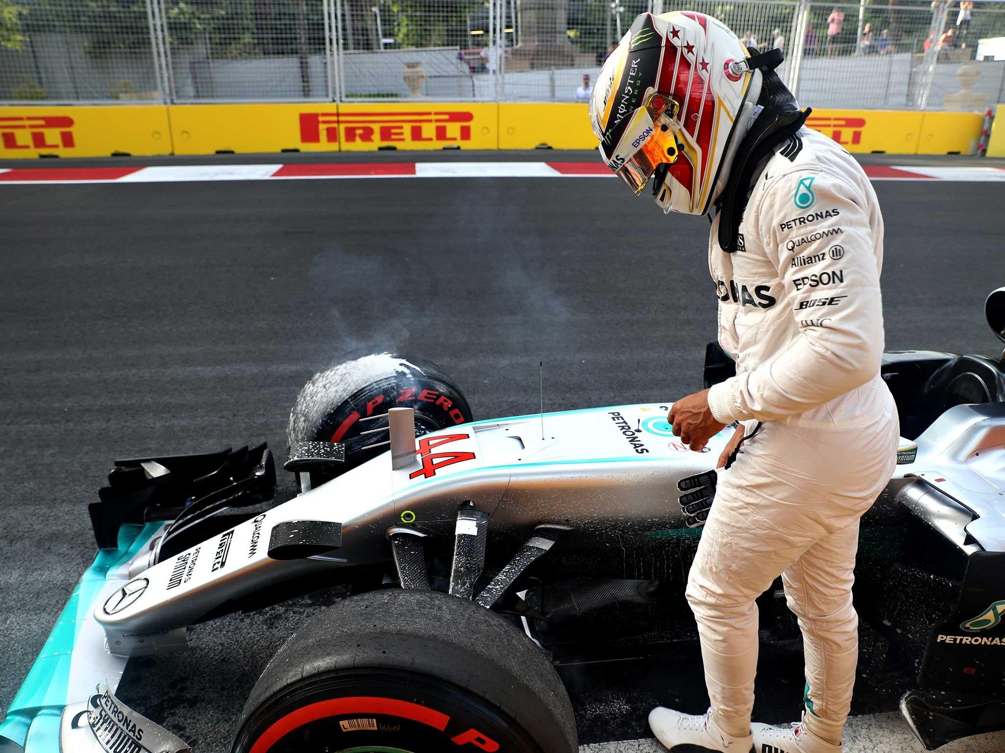 Lewis Hamilton is forced to stop on the circuit