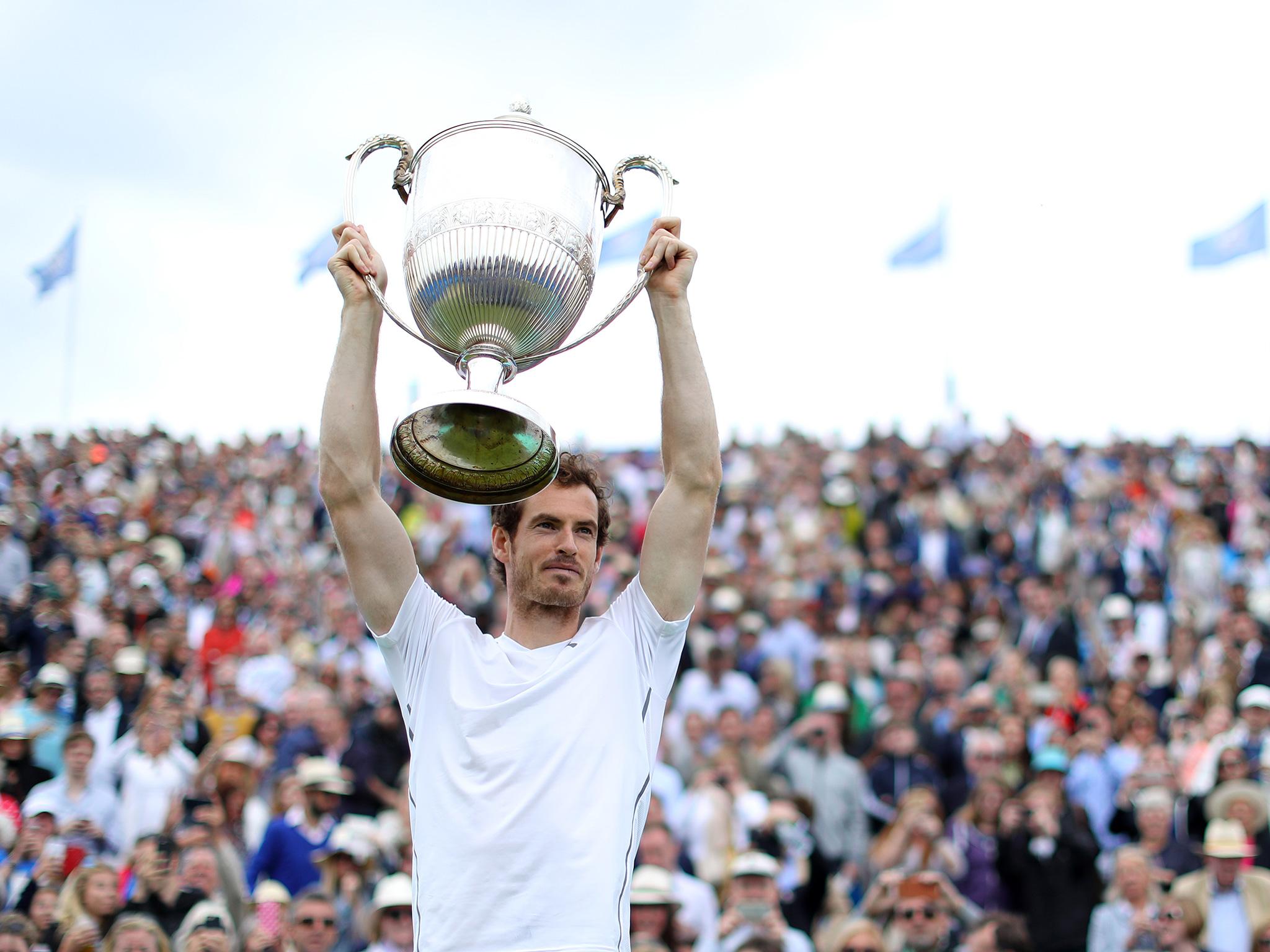 Andy Murray lifts the Queen's trophy for a fifth time in seven years