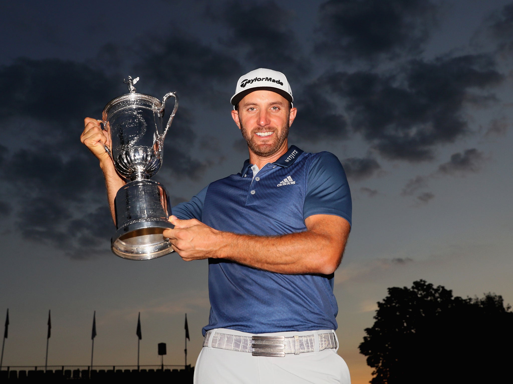 Dustin Johnson shows off his first major - the US Open - claimed on Sunday night at Oakmont