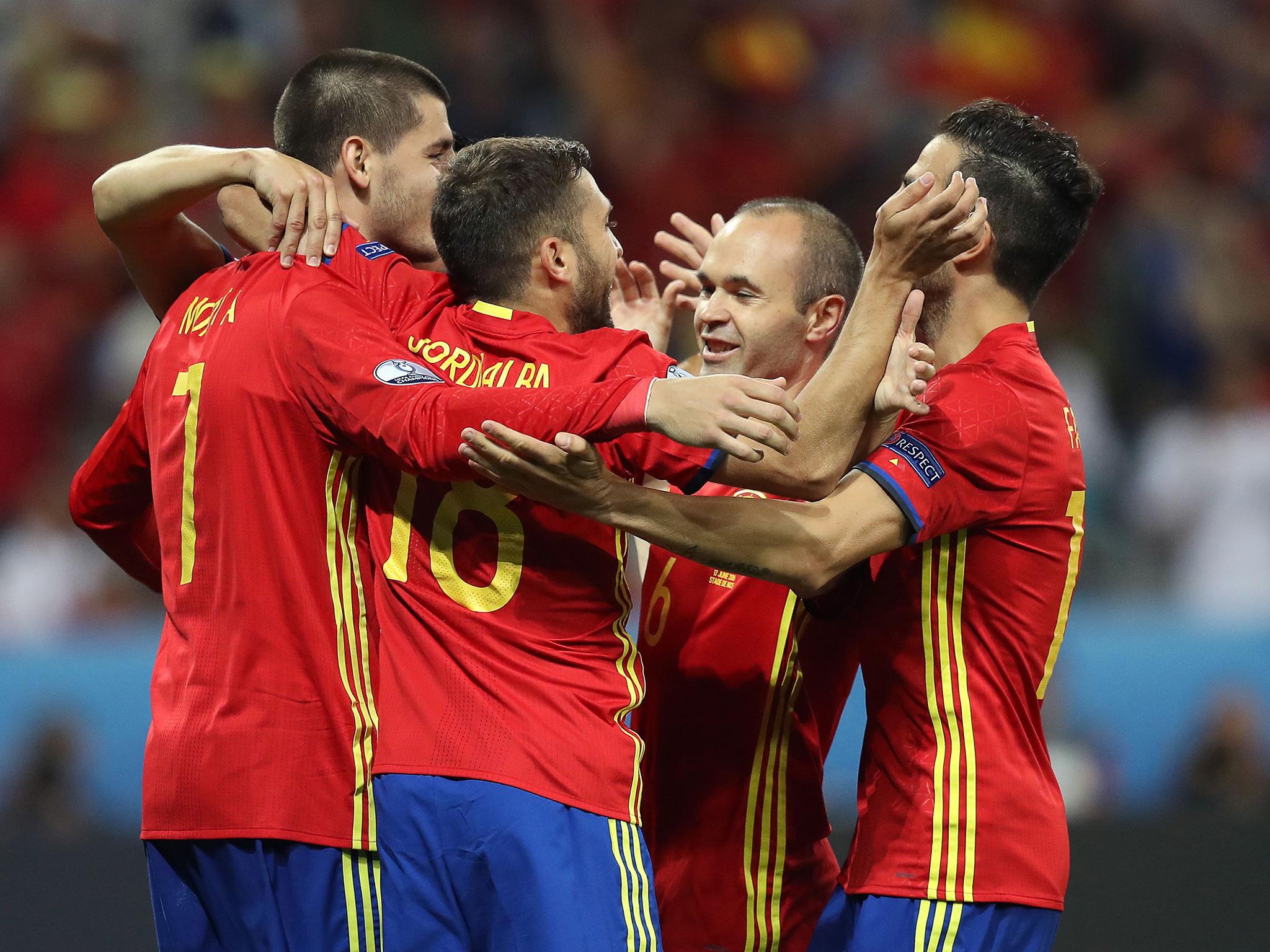 Spain players celebrate their comfortable victory over Turkey