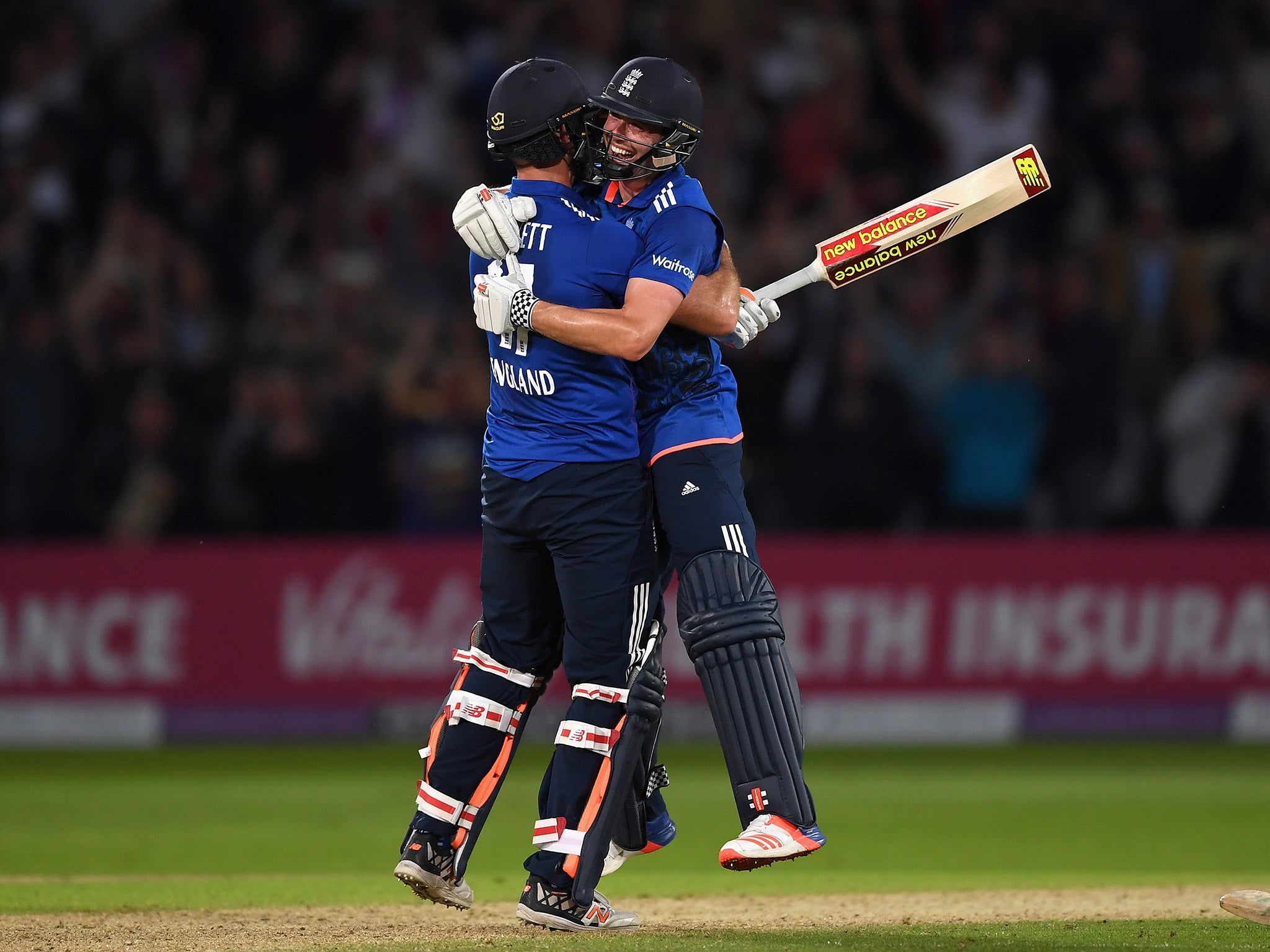 Liam Plunkett celebrates after hitting a six to salvage a draw for England against Sri Lanka