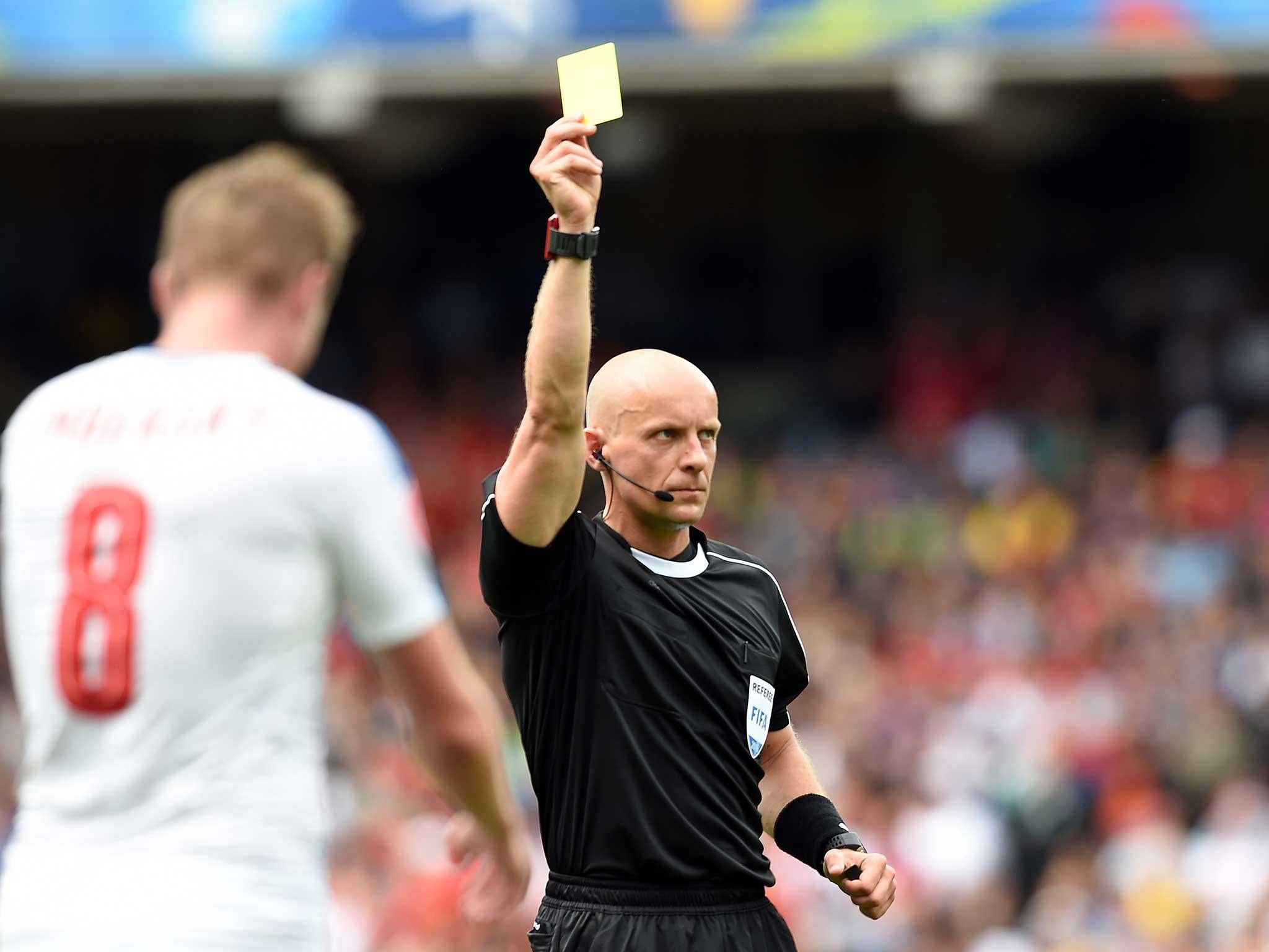 Referee Szymon Marciniak