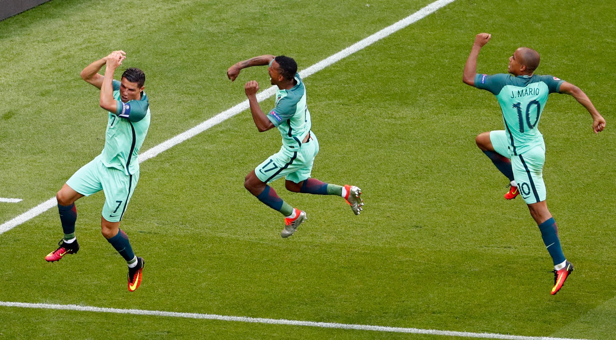 Ronaldo, Nani and Joao Mario celebrate Portugal's third equaliser