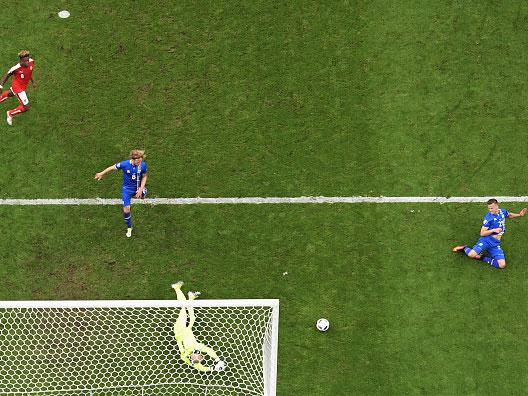 Arnor Ingvi Traustason squeezes in his late winner against Austria (Getty)